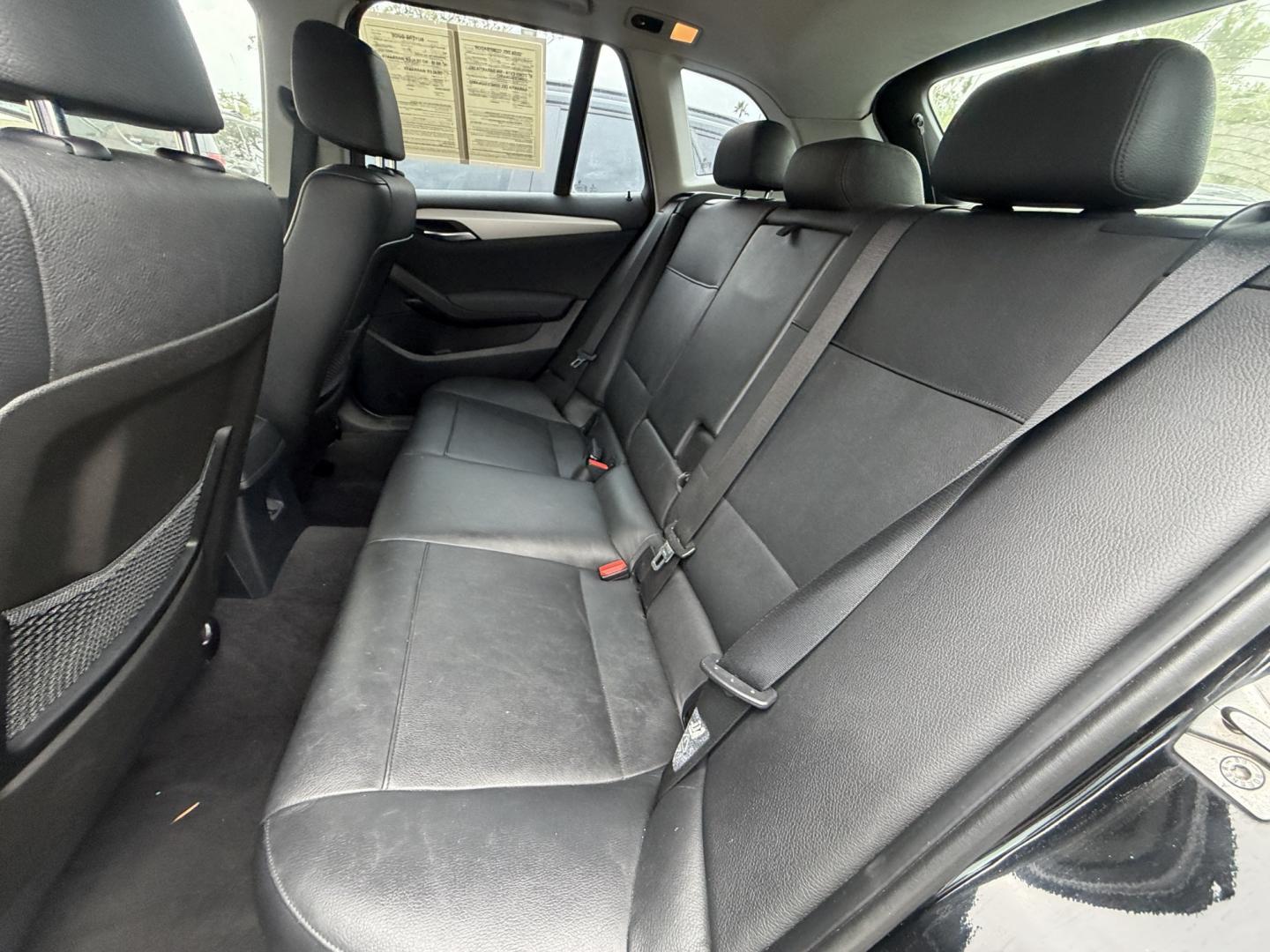 2014 Black /Black BMW X1 xDrive28i (WBAVL1C51EV) with an 2.0L L4 DOHC 16V engine, 8-Speed Automatic transmission, located at 30 S. Berkeley Avenue, Pasadena, CA, 91107, (626) 248-7567, 34.145447, -118.109398 - 2014 BMW X1 sDrive28i (Black on Black) – Pasadena Buy Here Pay Here | In-House Financing and Guaranteed Approval List Price: $7,795 | Dealer Document Fee: +$85.00 | Electronic Filing Fee: +$37.00 | Crown City Motors Price: $7,917 Drive today with bad credit, no credit, repossession, or bankr- Photo#8