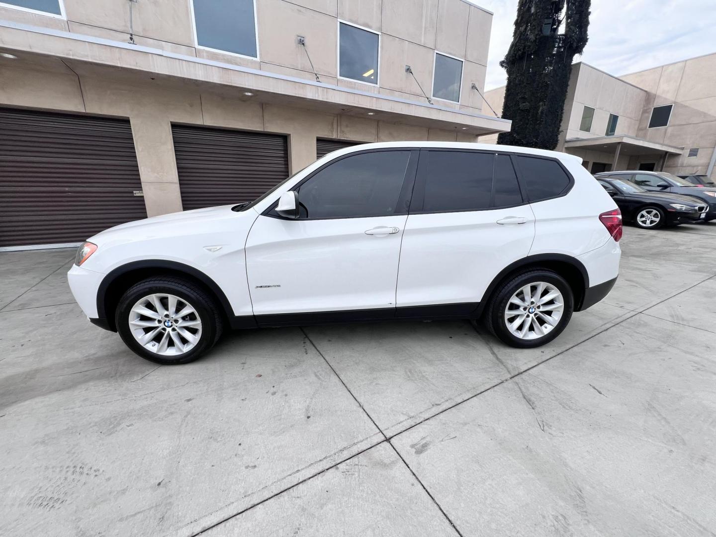 2014 Alpine White /Black BMW X3 xDrive28i (5UXWX9C5XE0) with an 2.0L L4 DOHC 16V engine, 8-Speed Automatic transmission, located at 30 S. Berkeley Avenue, Pasadena, CA, 91107, (626) 248-7567, 34.145447, -118.109398 - 2014 BMW X3 – White Luxury SUV with Buy Here Pay Here Financing in Pasadena, CA Looking for a stylish and dependable luxury SUV that fits your budget? This 2014 BMW X3 in White is available now at Crown City Motors in Pasadena for only $10,119.29. Known for its sleek design, premium comfort, an - Photo#1