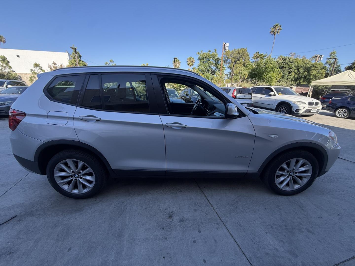 2014 Gray metallic /Black BMW X3 xDrive28i (5UXWX9C59E0) with an 2.0L L4 DOHC 16V engine, 8-Speed Automatic transmission, located at 30 S. Berkeley Avenue, Pasadena, CA, 91107, (626) 248-7567, 34.145447, -118.109398 - 2014 BMW X3 xDrive35i AWD – Luxury, Performance, and All-Weather Confidence Looking for a luxury SUV that delivers exhilarating performance, premium comfort, and advanced German engineering? This 2014 BMW X3 xDrive35i AWD is an outstanding choice. Powered by BMW's legendary turbocharged 3.0L in - Photo#5