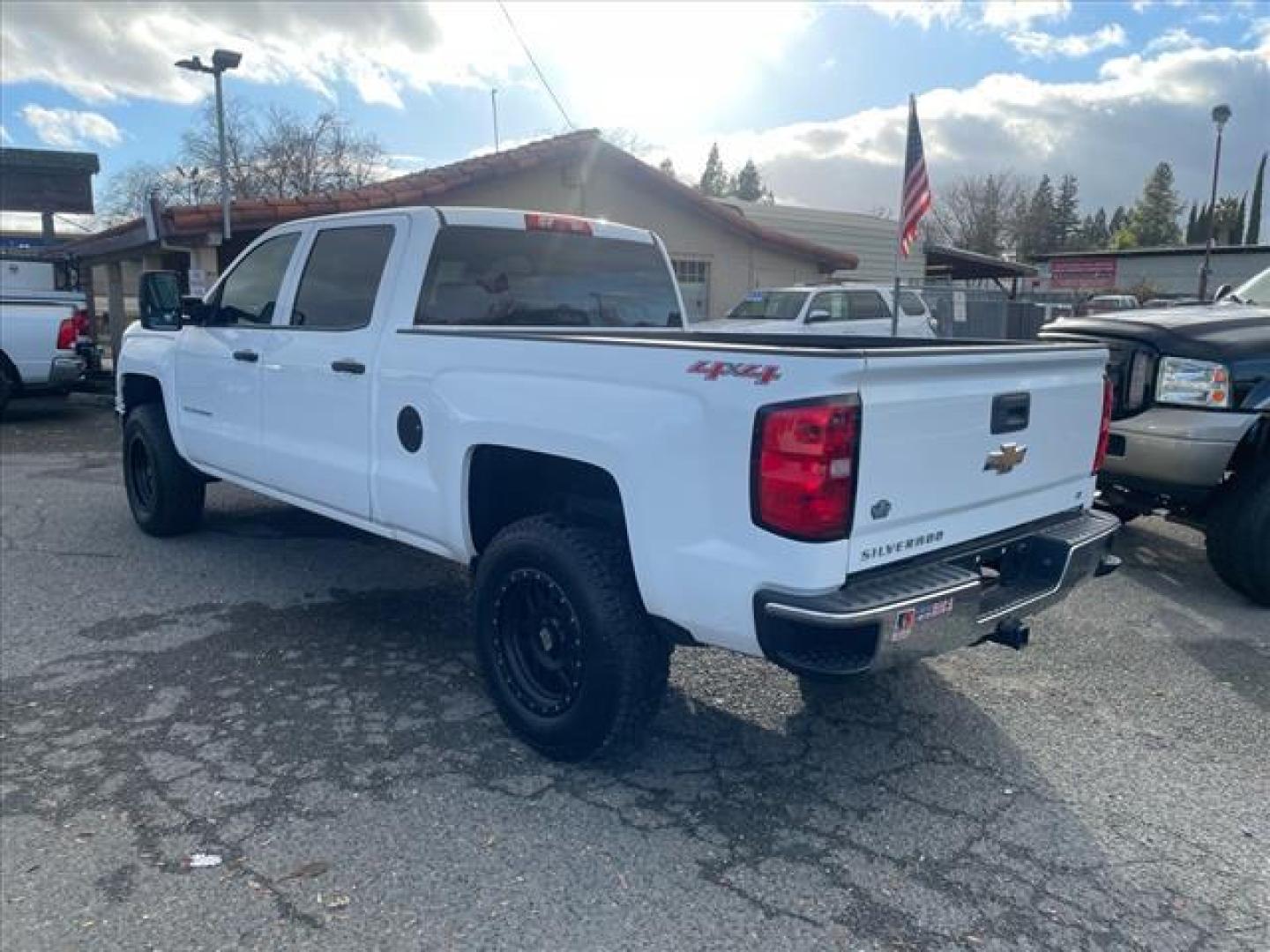 2014 Summit White Chevrolet Silverado 1500 LT (3GCUKREC7EG) with an 5.3L EcoTec3 5.3L Flex Fuel V8 355hp 383ft. lbs. Direct Injection engine, 6-Speed Shiftable Automatic w/Overdrive transmission, located at 800 Riverside Ave, Roseville, CA, 95678, 916-773-4549 & Toll Free: 866-719-4393, 38.732265, -121.291039 - 4X4 CREW CAB LT 95K MILES - Photo#2