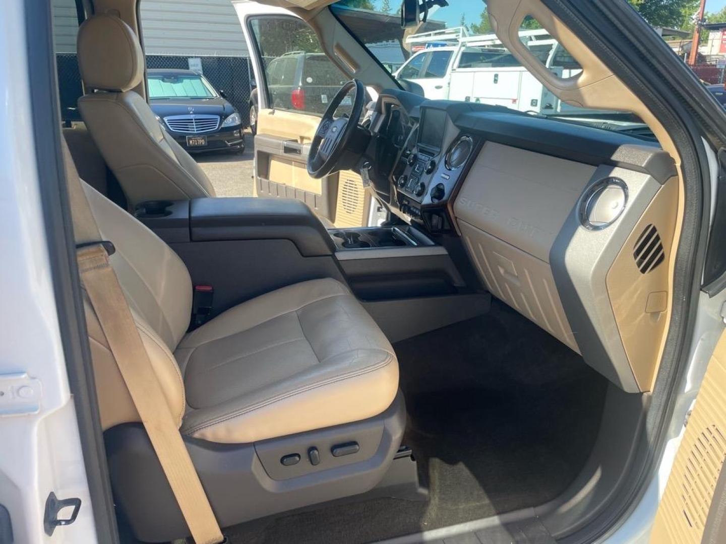 2014 Oxford White Ford F-350 Super Duty Lariat (1FT8W3CT8EE) with an 6.7L Power Stroke 6.7L Biodiesel Turbo V8 400hp 800ft. lbs. Common Rail Direct Injection engine, 6-Speed Shiftable Automatic transmission, located at 800 Riverside Ave, Roseville, CA, 95678, 916-773-4549 & Toll Free: 866-719-4393, 38.732265, -121.291039 - DIESEL CREW CAB DUALLY LARIAT SERVICE RECORDS ON CLEAN CARFAX - Photo#12
