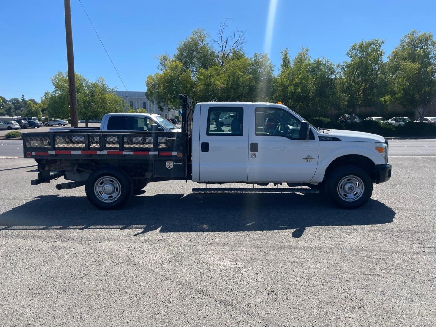 2014 White Ford F-350 Super Duty XL (1FD8W3FTXEE) with an 6.7L Power Stroke 6.7L Biodiesel Turbo V8 300hp 660ft. lbs. Common Rail Direct Injection engine, 6-Speed Shiftable Automatic transmission, located at 800 Riverside Ave, Roseville, CA, 95678, 916-773-4549 & Toll Free: 866-719-4393, 38.732265, -121.291039 - DIESEL CREW CAB 4X4 9 FOOT FLATBED ONE OWNER SERVICE RECORDS ON CLEAN CARFAX- Photo#5