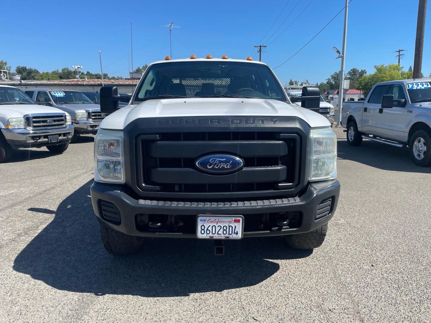 2014 White Ford F-350 Super Duty XL (1FD8W3FTXEE) with an 6.7L Power Stroke 6.7L Biodiesel Turbo V8 300hp 660ft. lbs. Common Rail Direct Injection engine, 6-Speed Shiftable Automatic transmission, located at 800 Riverside Ave, Roseville, CA, 95678, 916-773-4549 & Toll Free: 866-719-4393, 38.732265, -121.291039 - DIESEL CREW CAB 4X4 9 FOOT FLATBED ONE OWNER SERVICE RECORDS ON CLEAN CARFAX- Photo#6