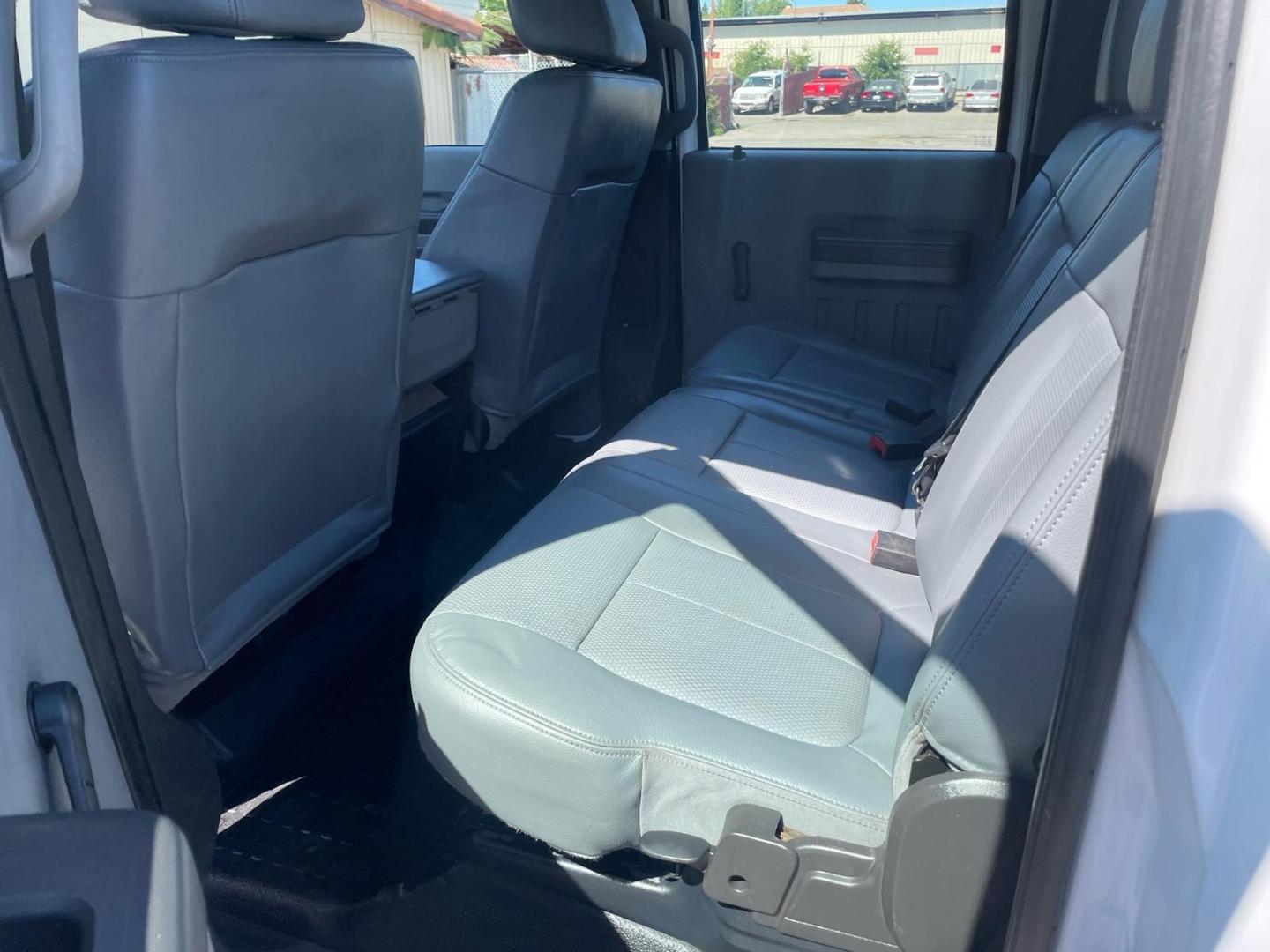 2014 White Ford F-350 Super Duty XL (1FD8W3FTXEE) with an 6.7L Power Stroke 6.7L Biodiesel Turbo V8 300hp 660ft. lbs. Common Rail Direct Injection engine, 6-Speed Shiftable Automatic transmission, located at 800 Riverside Ave, Roseville, CA, 95678, 916-773-4549 & Toll Free: 866-719-4393, 38.732265, -121.291039 - DIESEL CREW CAB 4X4 9 FOOT FLATBED ONE OWNER SERVICE RECORDS ON CLEAN CARFAX- Photo#9