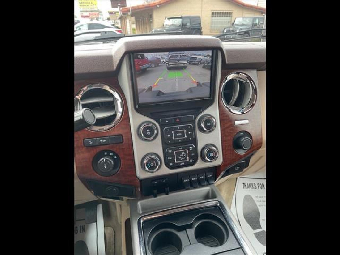 2014 Oxford White/Pale Adobe Metallic Ford F-250 Super Duty King Ranch (1FT7W2BT2EE) with an 6.7L Power Stroke 6.7L Biodiesel Turbo V8 400hp 800ft. lbs. Common Rail Direct Injection engine, 6-Speed Shiftable Automatic transmission, located at 800 Riverside Ave, Roseville, CA, 95678, 916-773-4549 & Toll Free: 866-719-4393, 38.732265, -121.291039 - DIESEL CREW CAB 4X4 FX4 KING RANCH SERVICE RECORDS - Photo#12