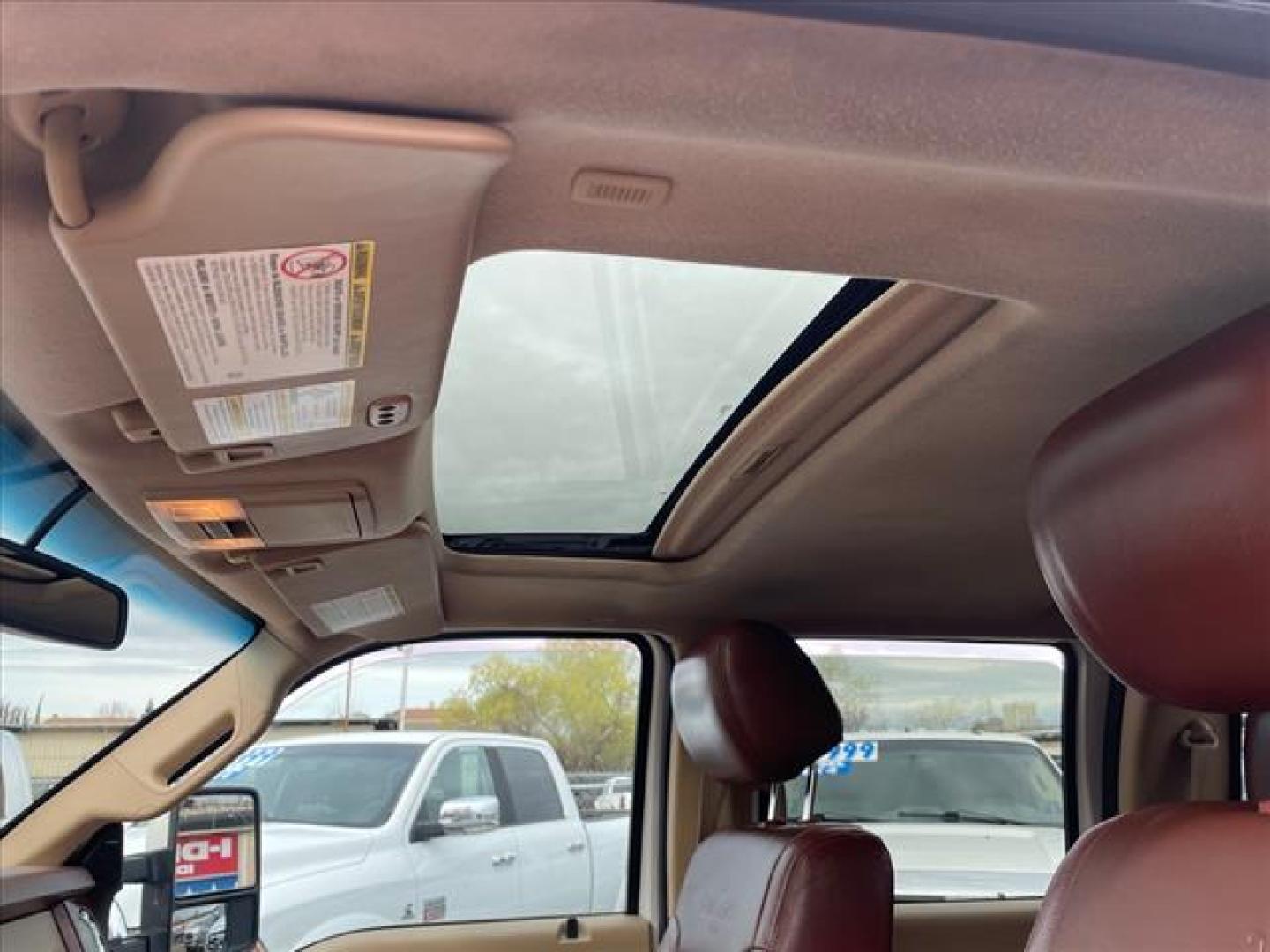 2014 Oxford White/Pale Adobe Metallic Ford F-250 Super Duty King Ranch (1FT7W2BT2EE) with an 6.7L Power Stroke 6.7L Biodiesel Turbo V8 400hp 800ft. lbs. Common Rail Direct Injection engine, 6-Speed Shiftable Automatic transmission, located at 800 Riverside Ave, Roseville, CA, 95678, 916-773-4549 & Toll Free: 866-719-4393, 38.732265, -121.291039 - DIESEL CREW CAB 4X4 FX4 KING RANCH SERVICE RECORDS - Photo#13