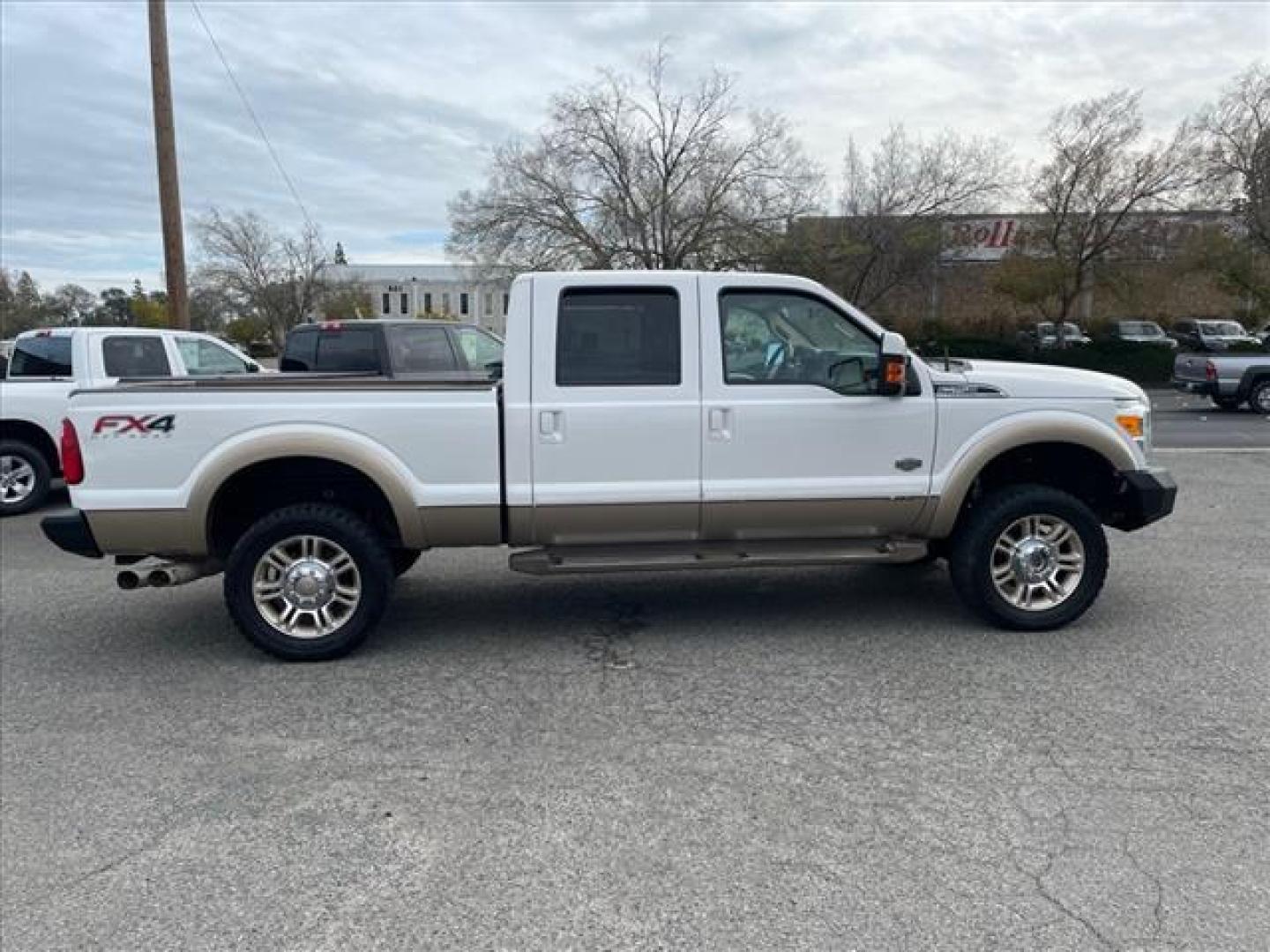 2014 Oxford White/Pale Adobe Metallic Ford F-250 Super Duty King Ranch (1FT7W2BT2EE) with an 6.7L Power Stroke 6.7L Biodiesel Turbo V8 400hp 800ft. lbs. Common Rail Direct Injection engine, 6-Speed Shiftable Automatic transmission, located at 800 Riverside Ave, Roseville, CA, 95678, 916-773-4549 & Toll Free: 866-719-4393, 38.732265, -121.291039 - DIESEL CREW CAB 4X4 FX4 KING RANCH SERVICE RECORDS - Photo#7