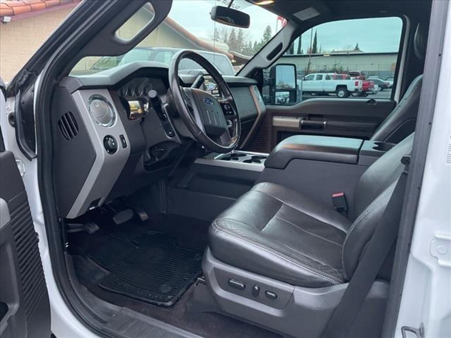 2014 Oxford White Ford F-350 Super Duty Lariat (1FT8W3BT3EE) with an 6.7L Power Stroke 6.7L Biodiesel Turbo V8 400hp 800ft. lbs. Common Rail Direct Injection engine, 6-Speed Shiftable Automatic transmission, located at 800 Riverside Ave, Roseville, CA, 95678, 916-773-4549 & Toll Free: 866-719-4393, 38.732265, -121.291039 - DIESEL CREW CAB 4X4 FX4 LARIAT ONE OWNER OIL SERVICE RECORDS REGULARLY CHANGED ONE OWNER MOON ROOF - Photo#13