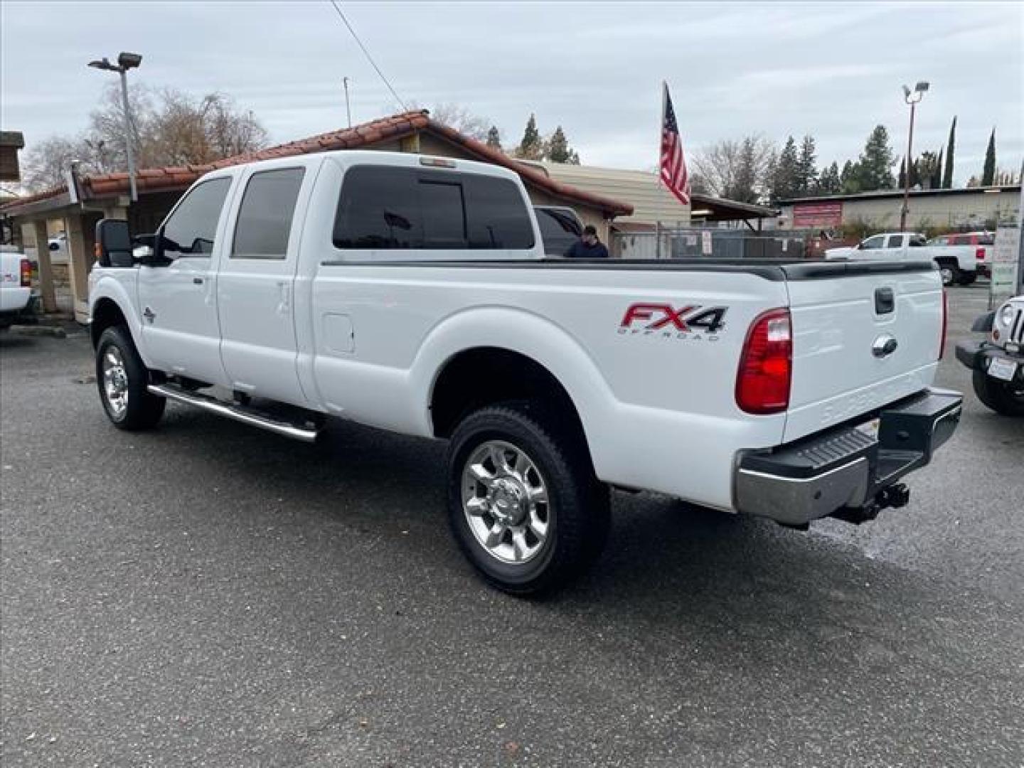 2014 Oxford White Ford F-350 Super Duty Lariat (1FT8W3BT3EE) with an 6.7L Power Stroke 6.7L Biodiesel Turbo V8 400hp 800ft. lbs. Common Rail Direct Injection engine, 6-Speed Shiftable Automatic transmission, located at 800 Riverside Ave, Roseville, CA, 95678, 916-773-4549 & Toll Free: 866-719-4393, 38.732265, -121.291039 - DIESEL CREW CAB 4X4 FX4 LARIAT ONE OWNER OIL SERVICE RECORDS REGULARLY CHANGED ONE OWNER MOON ROOF - Photo#3
