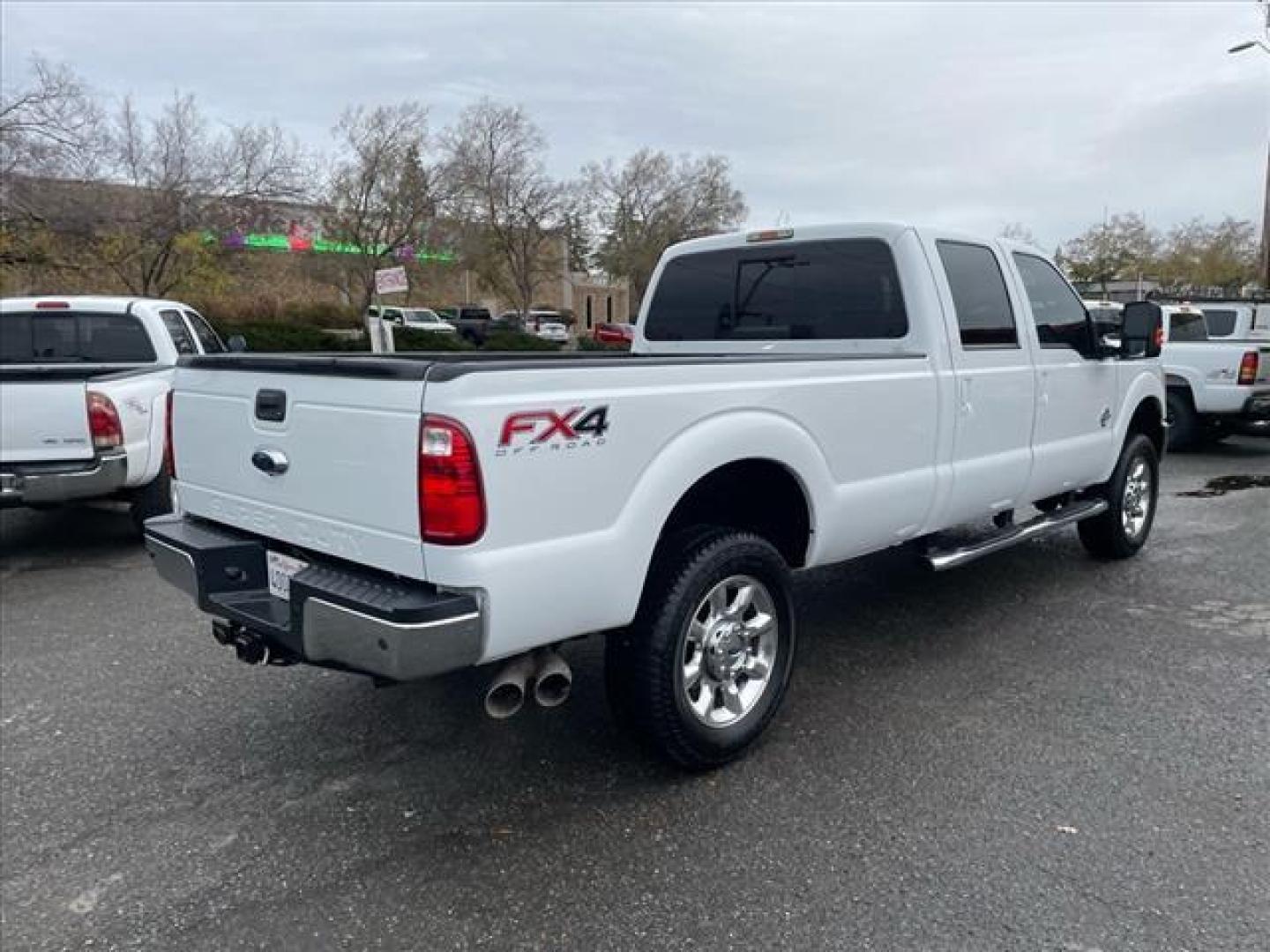 2014 Oxford White Ford F-350 Super Duty Lariat (1FT8W3BT3EE) with an 6.7L Power Stroke 6.7L Biodiesel Turbo V8 400hp 800ft. lbs. Common Rail Direct Injection engine, 6-Speed Shiftable Automatic transmission, located at 800 Riverside Ave, Roseville, CA, 95678, 916-773-4549 & Toll Free: 866-719-4393, 38.732265, -121.291039 - DIESEL CREW CAB 4X4 FX4 LARIAT ONE OWNER OIL SERVICE RECORDS REGULARLY CHANGED ONE OWNER MOON ROOF - Photo#4
