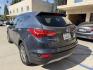 2014 Night Sky Pearl. /Gray Hyundai Santa Fe Sport 2.4 FWD (5XYZT3LB4EG) with an 2.4L L4 DOHC 16V engine, 6-Speed Automatic transmission, located at 30 S. Berkeley Avenue, Pasadena, CA, 91107, (626) 248-7567, 34.145447, -118.109398 - DEALER IDENTIFIER: Crown City Motors Sales | Buy Here Pay Here Pasadena TARGET REGIONS: Pasadena, San Gabriel Valley, Riverside, San Bernardino FINANCING SPECIALTY: Subprime Auto Lending, In-House Financing, Bad Credit Car Loans CA VEHICLE: 2014 Hyundai Santa Fe Sport 2.4L (VIN: 5XYZT3LB4EG131415- Photo#1