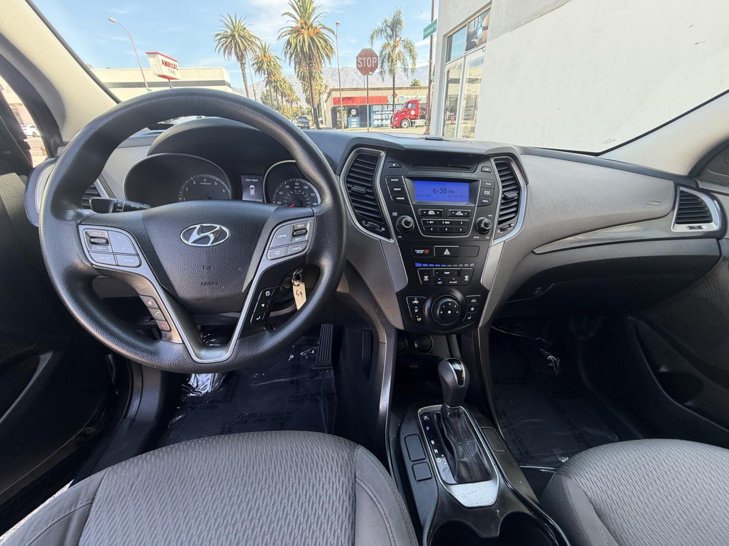 2014 Night Sky Pearl. /Gray Hyundai Santa Fe Sport 2.4 FWD (5XYZT3LB4EG) with an 2.4L L4 DOHC 16V engine, 6-Speed Automatic transmission, located at 30 S. Berkeley Avenue, Pasadena, CA, 91107, (626) 248-7567, 34.145447, -118.109398 - DEALER IDENTIFIER: Crown City Motors Sales | Buy Here Pay Here Pasadena TARGET REGIONS: Pasadena, San Gabriel Valley, Riverside, San Bernardino FINANCING SPECIALTY: Subprime Auto Lending, In-House Financing, Bad Credit Car Loans CA VEHICLE: 2014 Hyundai Santa Fe Sport 2.4L (VIN: 5XYZT3LB4EG131415- Photo#12