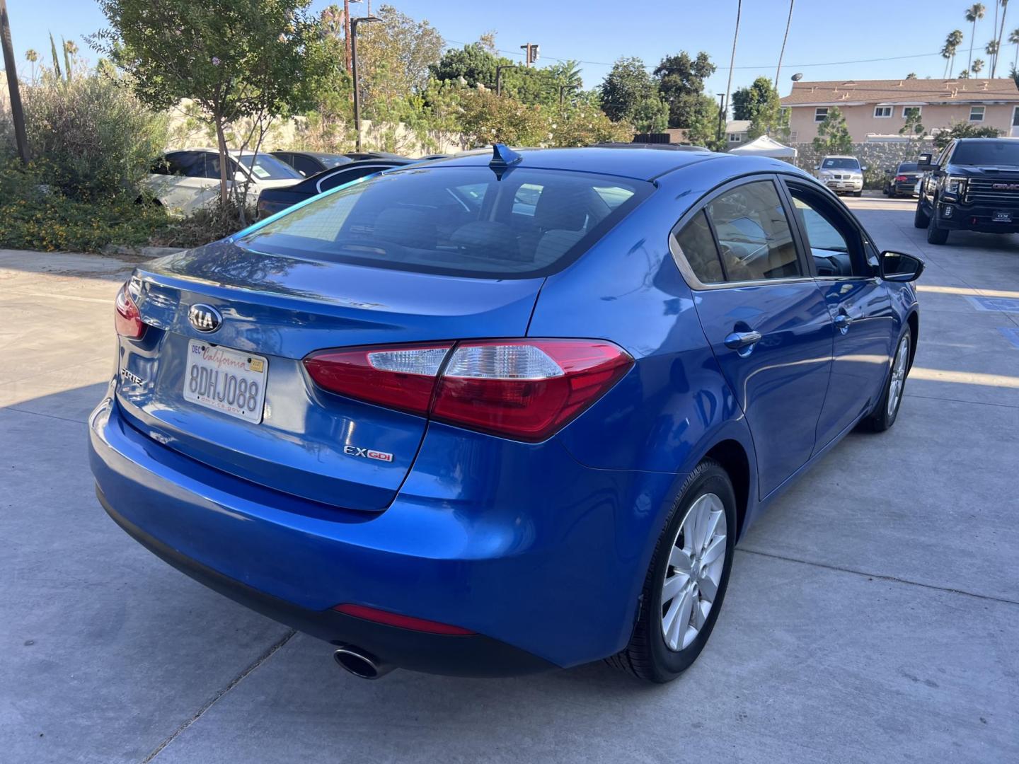 2014 Abyss Blue Pear /Black Kia Forte EX (KNAFX4A82E5) with an 2.0L L4 DOHC 16V engine, 6-Speed Automatic transmission, located at 30 S. Berkeley Avenue, Pasadena, CA, 91107, (626) 248-7567, 34.145447, -118.109398 - ? 2014 Kia Forte EX – Affordable Style and Efficiency with Easy BHPH Financing VIN: KNAFX4A82E5106328 Location: Crown City Motors, Pasadena, CA Financing Options: Buy Here Pay Here | Low Down Payment | Bad Credit OK Looking for a sleek, efficient, and budget-friendly sedan with all the featu - Photo#11