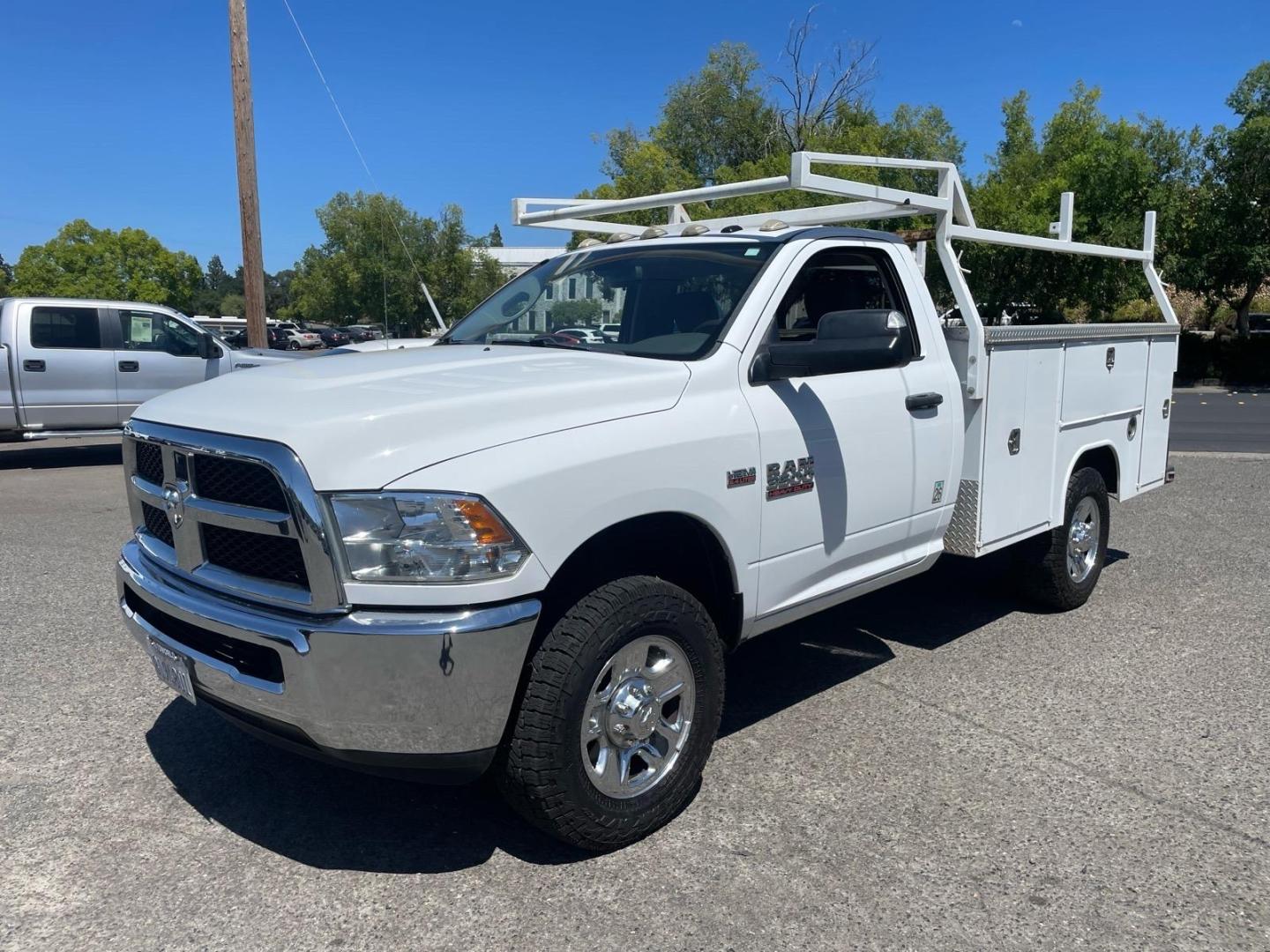 2014 White RAM 3500 Tradesman (3C7WR8AJ2EG) with an HEMI 6.4L V8 370hp 429ft. lbs. Other engine, 6-Speed Shiftable Automatic transmission, located at 800 Riverside Ave, Roseville, CA, 95678, 916-773-4549 & Toll Free: 866-719-4393, 38.732265, -121.291039 - UTILITY BED 72K MILES CLEAN CARFAX- Photo#0