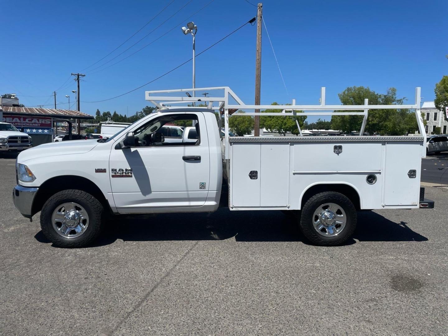 2014 White RAM 3500 Tradesman (3C7WR8AJ2EG) with an HEMI 6.4L V8 370hp 429ft. lbs. Other engine, 6-Speed Shiftable Automatic transmission, located at 800 Riverside Ave, Roseville, CA, 95678, 916-773-4549 & Toll Free: 866-719-4393, 38.732265, -121.291039 - UTILITY BED 72K MILES CLEAN CARFAX- Photo#1