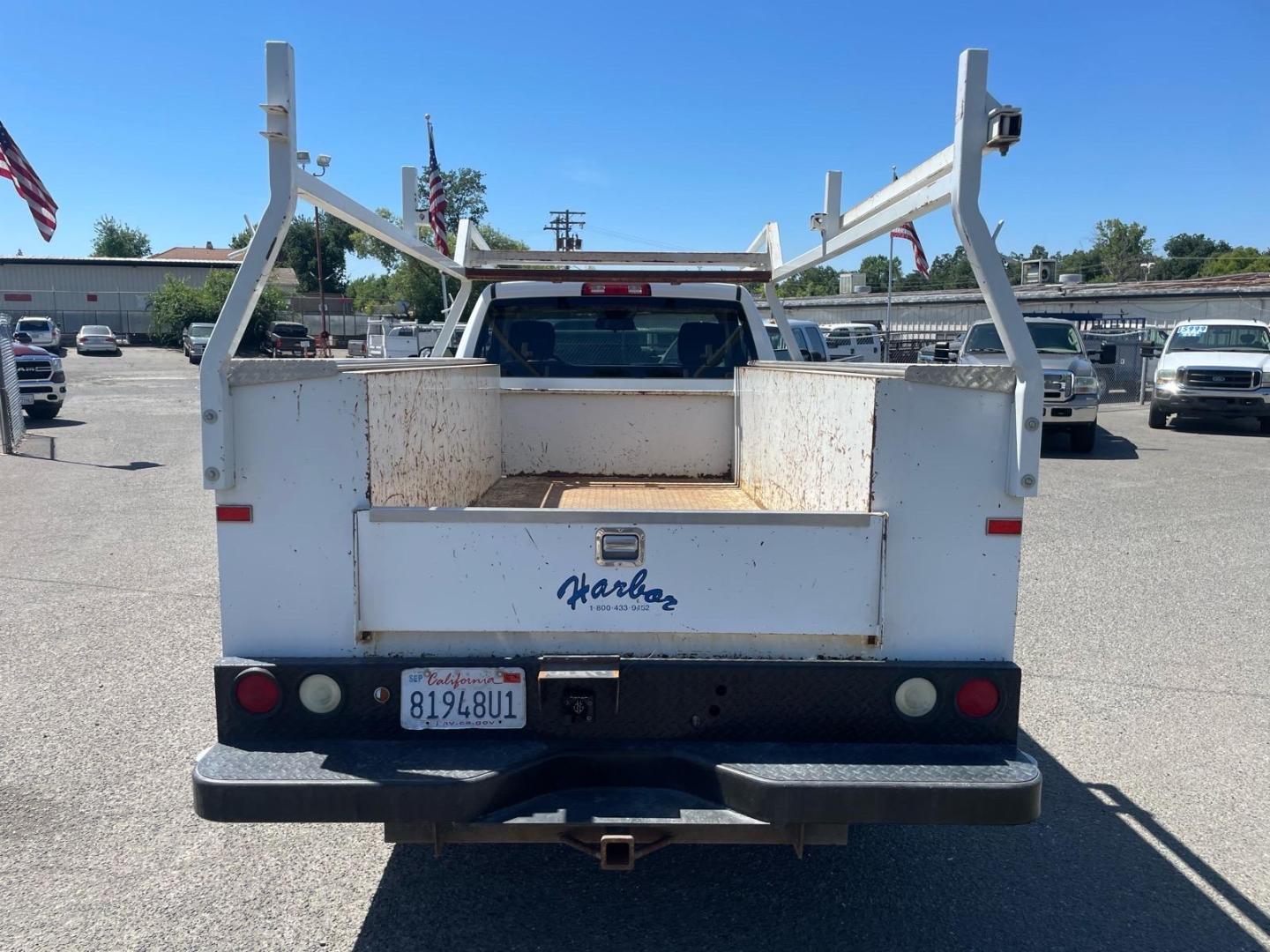 2014 White RAM 3500 Tradesman (3C7WR8AJ2EG) with an HEMI 6.4L V8 370hp 429ft. lbs. Other engine, 6-Speed Shiftable Automatic transmission, located at 800 Riverside Ave, Roseville, CA, 95678, 916-773-4549 & Toll Free: 866-719-4393, 38.732265, -121.291039 - UTILITY BED 72K MILES CLEAN CARFAX- Photo#3