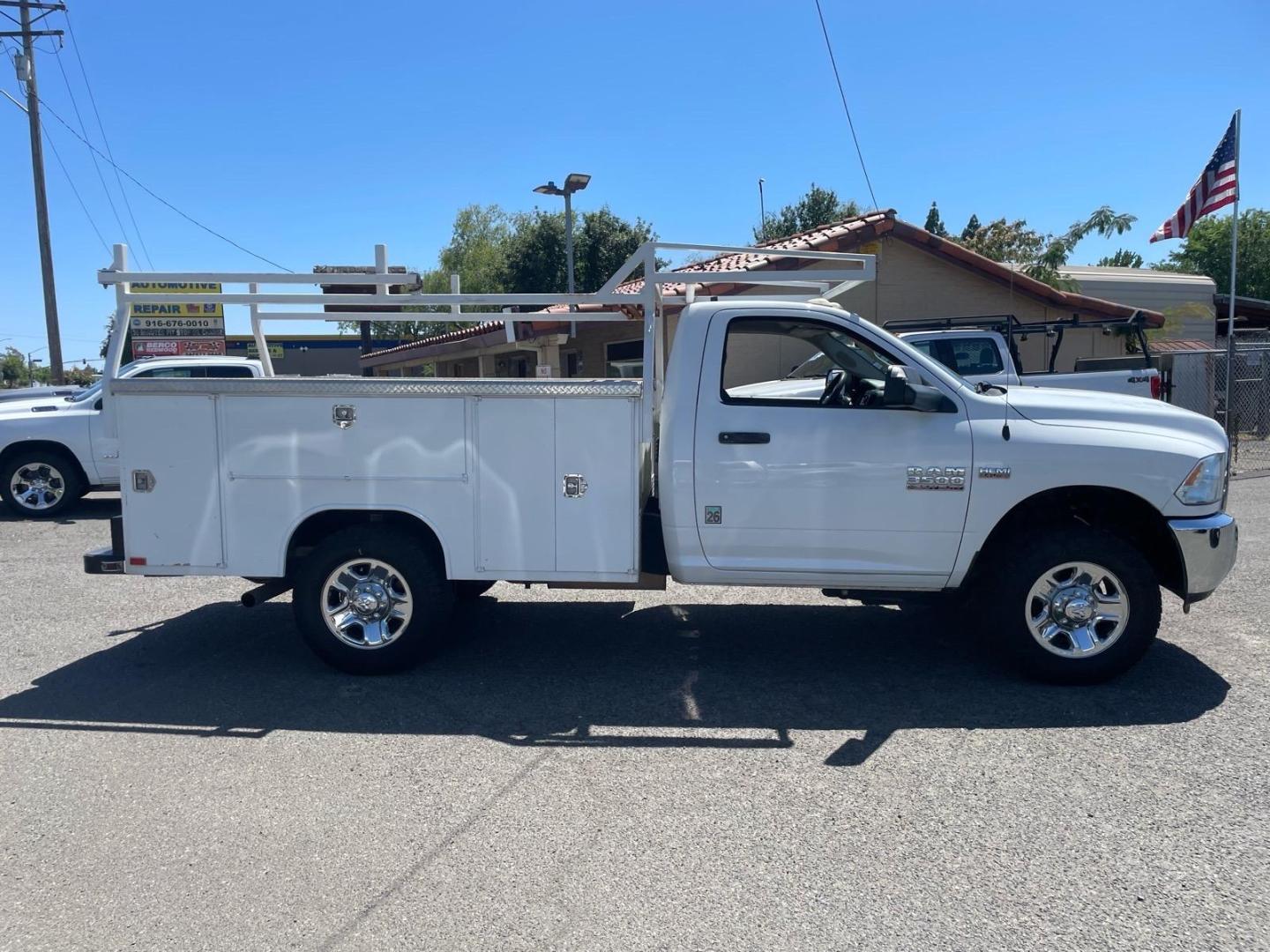 2014 White RAM 3500 Tradesman (3C7WR8AJ2EG) with an HEMI 6.4L V8 370hp 429ft. lbs. Other engine, 6-Speed Shiftable Automatic transmission, located at 800 Riverside Ave, Roseville, CA, 95678, 916-773-4549 & Toll Free: 866-719-4393, 38.732265, -121.291039 - UTILITY BED 72K MILES CLEAN CARFAX- Photo#5