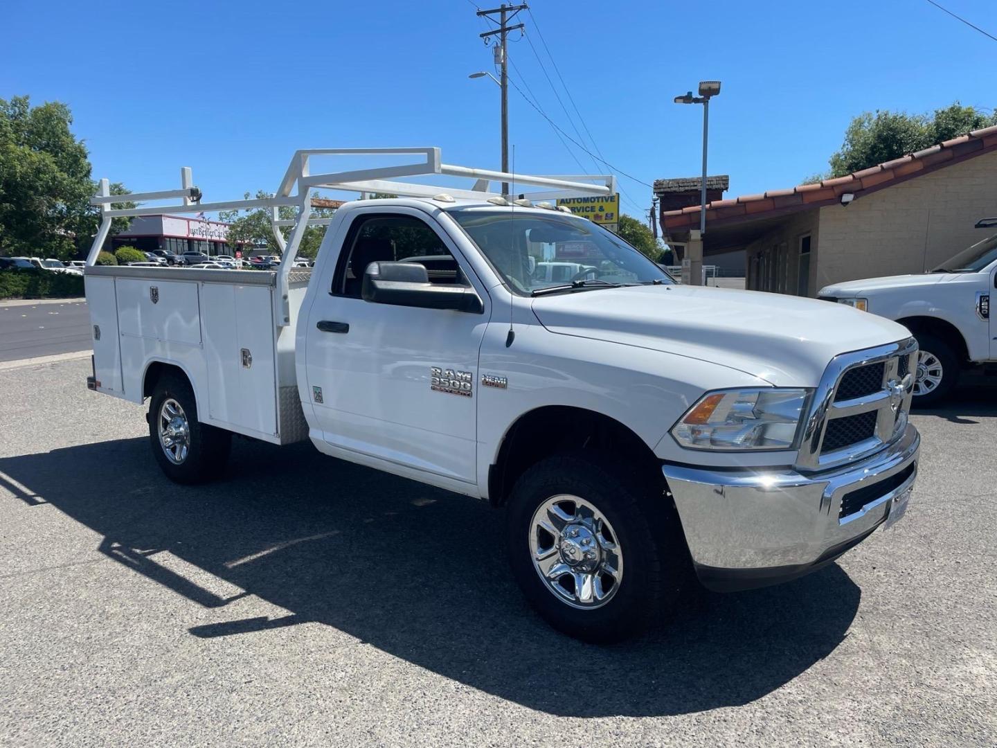 2014 White RAM 3500 Tradesman (3C7WR8AJ2EG) with an HEMI 6.4L V8 370hp 429ft. lbs. Other engine, 6-Speed Shiftable Automatic transmission, located at 800 Riverside Ave, Roseville, CA, 95678, 916-773-4549 & Toll Free: 866-719-4393, 38.732265, -121.291039 - UTILITY BED 72K MILES CLEAN CARFAX- Photo#6