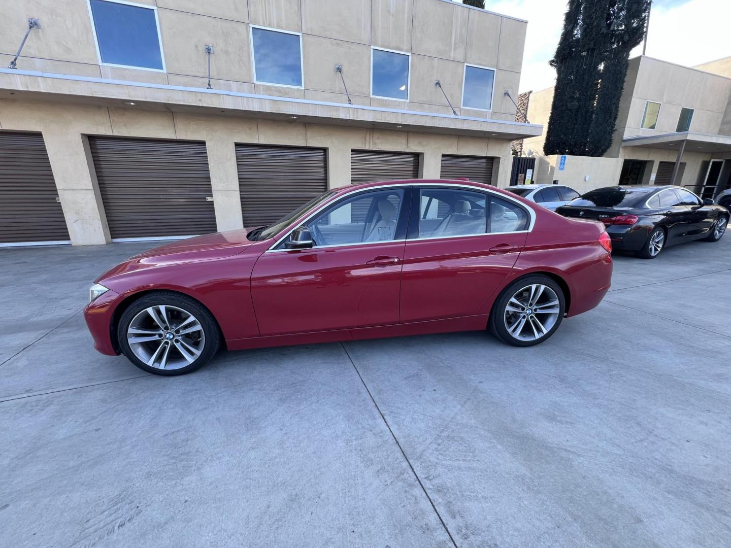 2015 Barcelona Red Metallic /Black BMW 3-Series 328i Sedan (WBA3A5G56FN) with an 2.0L L4 DOHC 16V engine, 8-Speed Automatic transmission, located at 30 S. Berkeley Avenue, Pasadena, CA, 91107, (626) 248-7567, 34.145447, -118.109398 - 2015 BMW 328 for Sale at Crown City Motors – Bad Credit? No Problem! Looking for a luxurious, feature-packed used car in Pasadena, CA? Visit Crown City Motors at 30 S Berkeley Ave, Pasadena, CA 91107, and check out this stunning 2015 BMW 328 (VIN: WBA3A5G56FNS82016) with just 75,450 miles! As a p - Photo#2