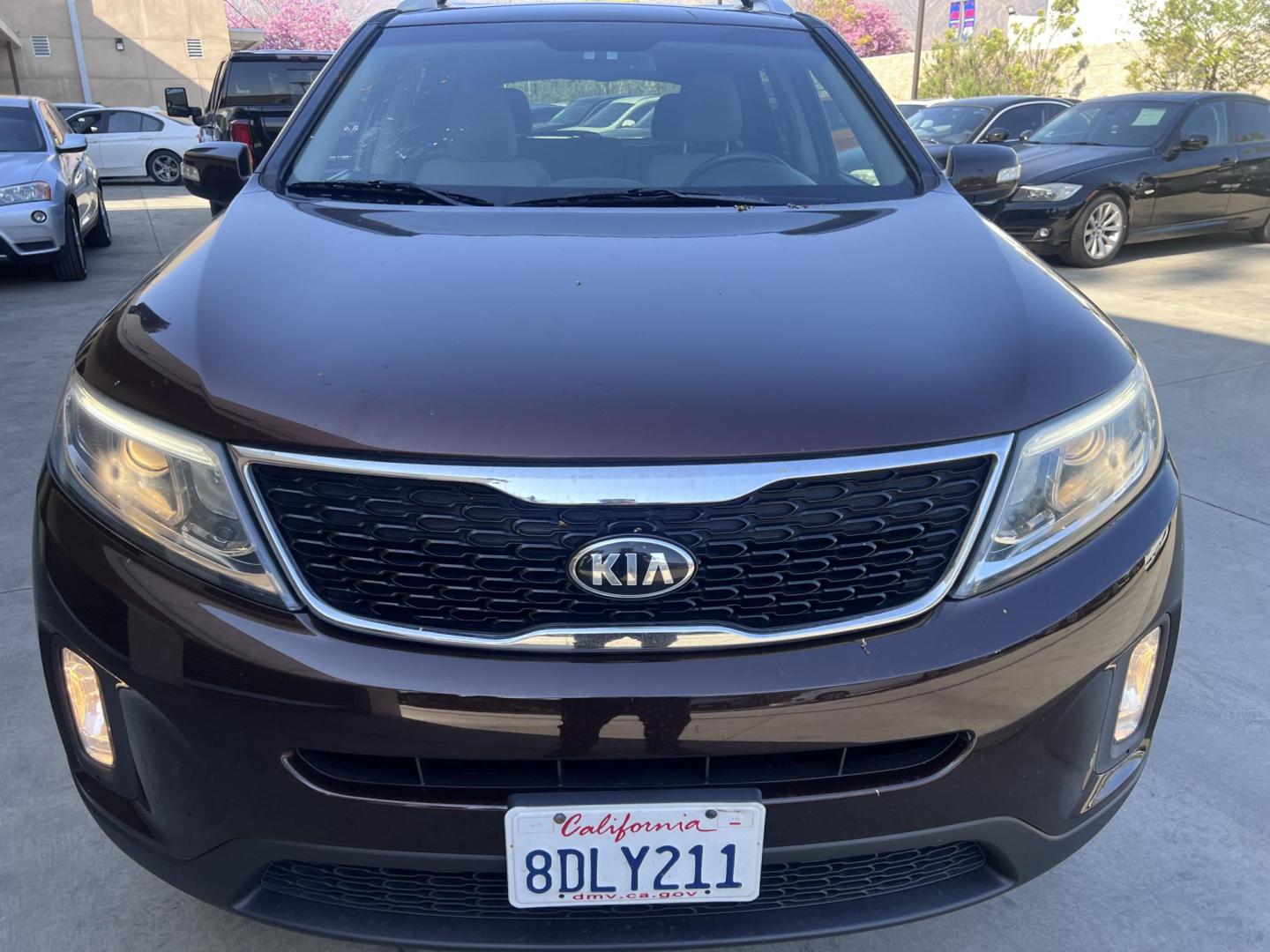 2015 Dark Cherry Pearl /Tan Kia Sorento LX 2WD (5XYKT3A69FG) with an 2.4L L4 DOHC 16V engine, 6-Speed Automatic transmission, located at 30 S. Berkeley Avenue, Pasadena, CA, 91107, (626) 248-7567, 34.145447, -118.109398 - 2015 Kia Sorento – Affordable, Reliable, and Stylish SUV in Pasadena, CA | Buy Here Pay Here Available Looking for a dependable and stylish SUV that won't break the bank? Crown City Motors in Pasadena, CA is proud to offer this 2015 Kia Sorento in a stunning burgundy finish (Dark Cherry Pearl / R - Photo#6