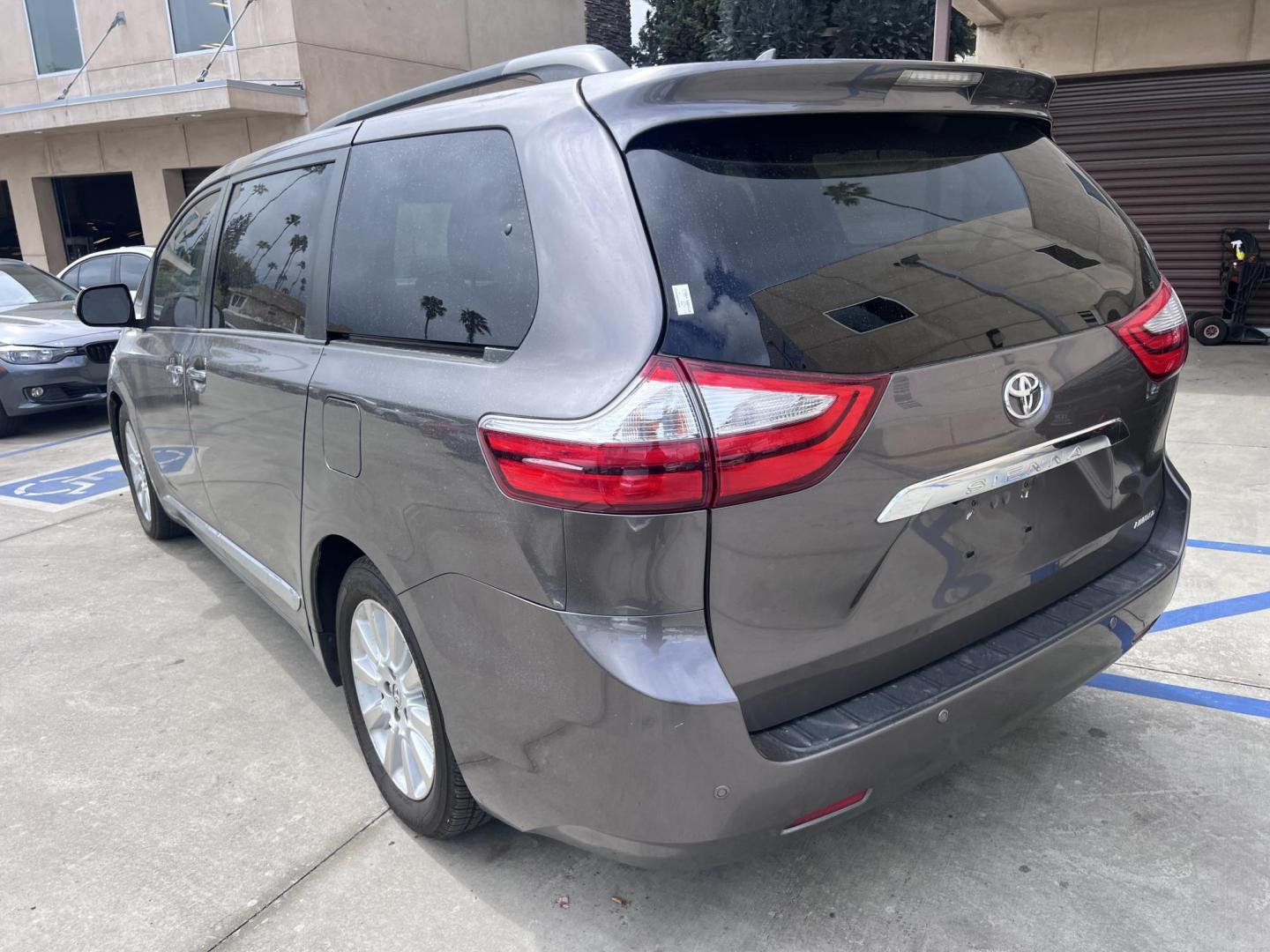2015 Gray /gray Toyota Sienna XLE FWD 8-Passenger V6 (5TDYK3DC5FS) with an 3.5L V6 EFI DOHC 24V engine, 5-Speed Automatic transmission, located at 30 S. Berkeley Avenue, Pasadena, CA, 91107, (626) 248-7567, 34.145447, -118.109398 - Crown City Motors is a used “Buy Here Pay Here” car dealer in Pasadena CA. “Buy Here Pay Here” financing, means that when you purchase your vehicle from our dealership, that you make the payments to the dealership as well. We do not need the banks approval to get you approved for a used auto - Photo#2