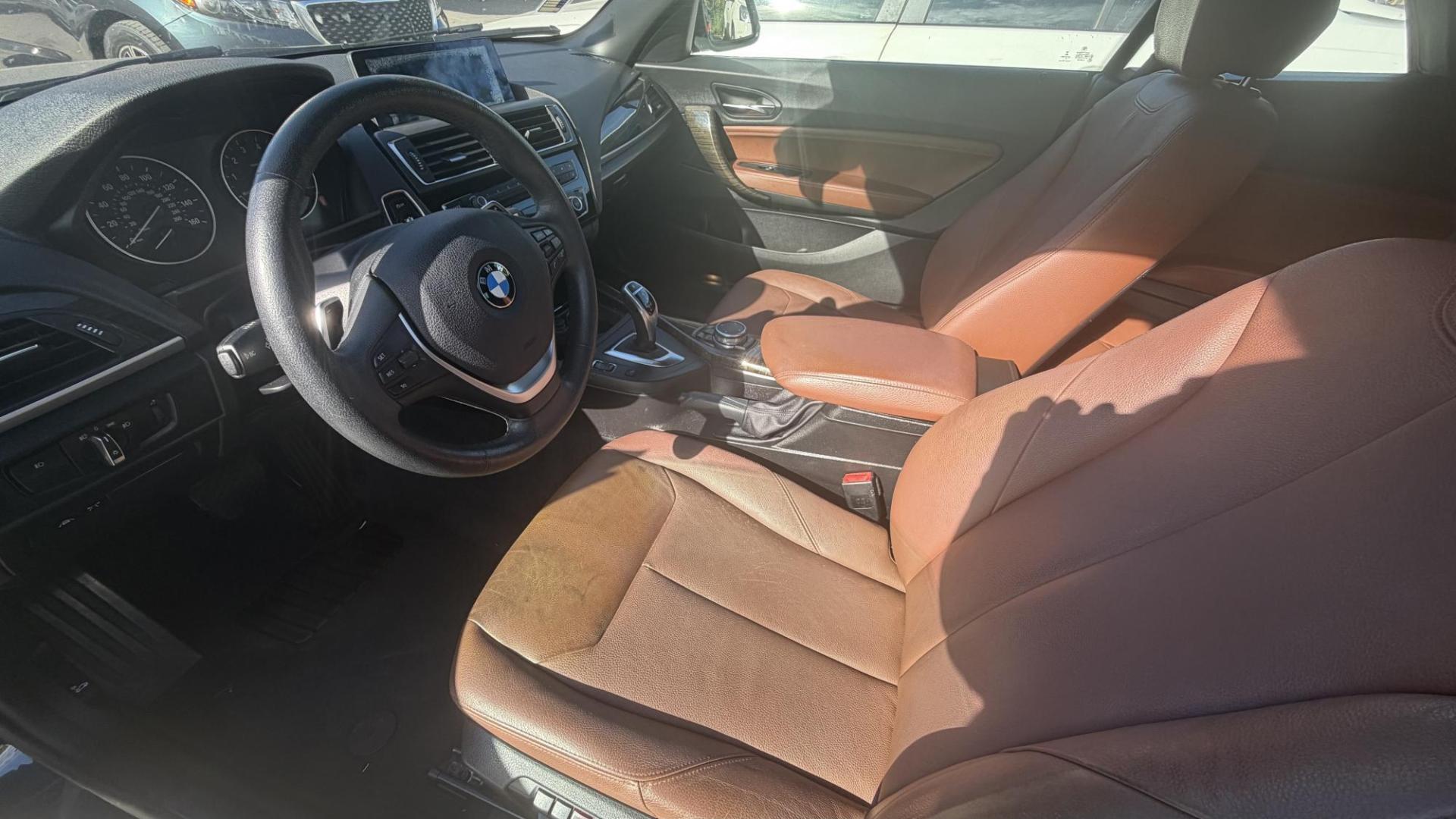 2015 Atlantis Metallic /Black BMW 2-Series 228xi Convertible (WBA1K7C54FV) with an 2.0L L4 DOHC 16V engine, 8A transmission, located at 30 S. Berkeley Avenue, Pasadena, CA, 91107, (626) 248-7567, 34.145447, -118.109398 - 2015 BMW 228i Convertible – Atlantis Metallic | Luxury, Style and Easy Financing in Pasadena Turn heads wherever you go in this stunning 2015 BMW 228i Convertible, finished in rare Atlantis Metallic, a gorgeous blue-green color that shifts beautifully in the sunlight. With its black leather i - Photo#9