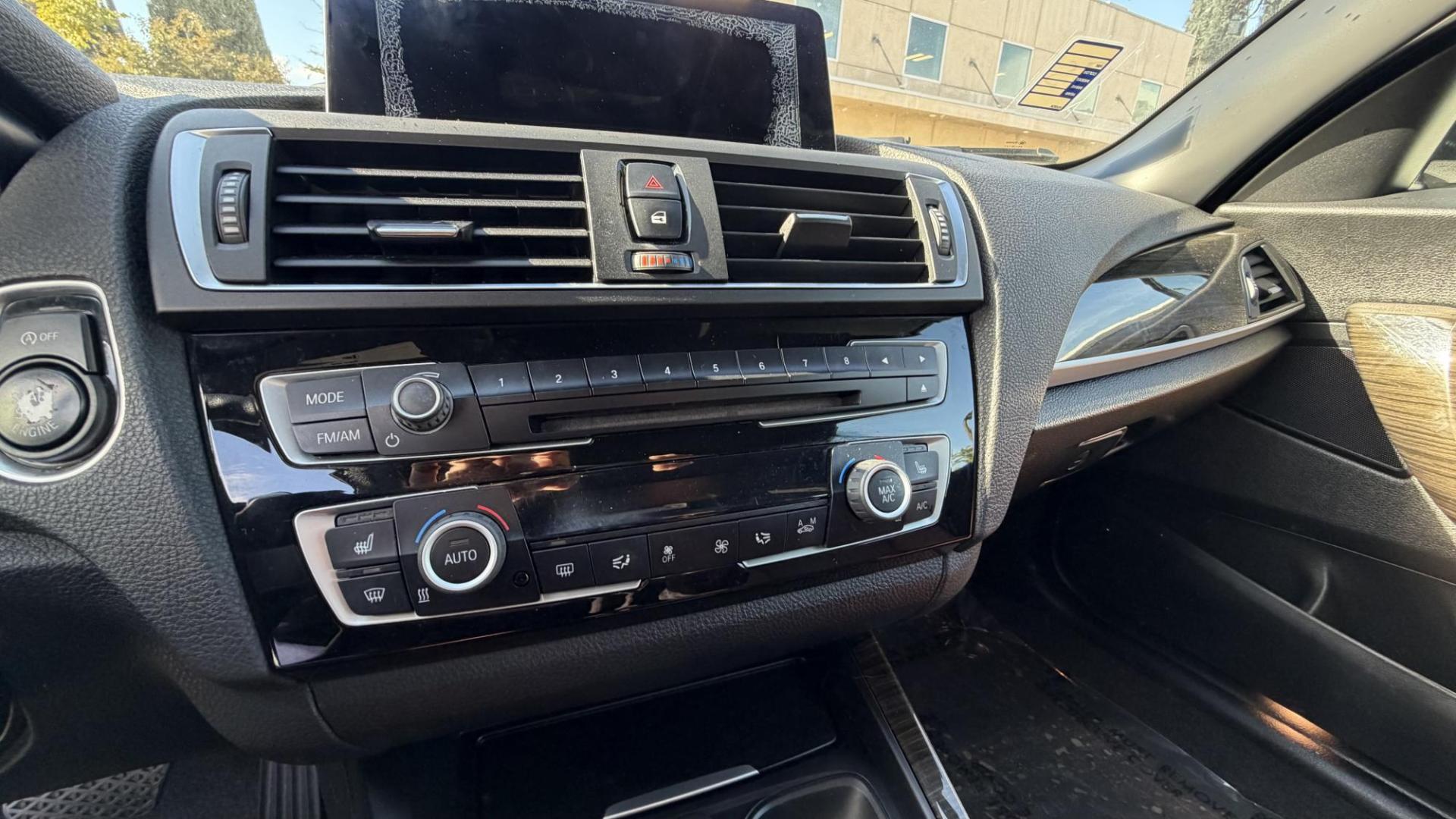 2015 Atlantis Metallic /Black BMW 2-Series 228xi Convertible (WBA1K7C54FV) with an 2.0L L4 DOHC 16V engine, 8A transmission, located at 30 S. Berkeley Avenue, Pasadena, CA, 91107, (626) 248-7567, 34.145447, -118.109398 - 2015 BMW 228i Convertible – Atlantis Metallic | Luxury, Style and Easy Financing in Pasadena Turn heads wherever you go in this stunning 2015 BMW 228i Convertible, finished in rare Atlantis Metallic, a gorgeous blue-green color that shifts beautifully in the sunlight. With its black leather i - Photo#11