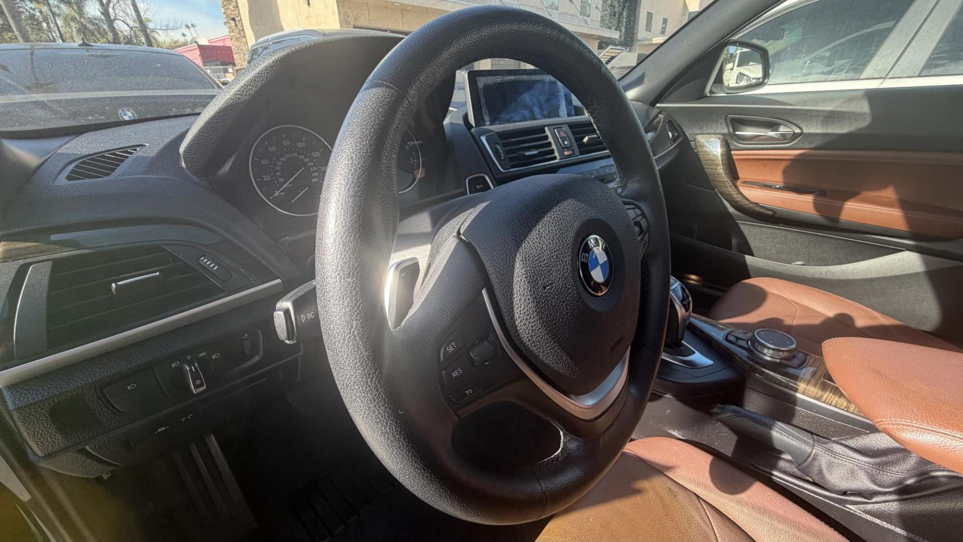 2015 Atlantis Metallic /Black BMW 2-Series 228xi Convertible (WBA1K7C54FV) with an 2.0L L4 DOHC 16V engine, 8A transmission, located at 30 S. Berkeley Avenue, Pasadena, CA, 91107, (626) 248-7567, 34.145447, -118.109398 - 2015 BMW 228i Convertible – Atlantis Metallic | Luxury, Style and Easy Financing in Pasadena Turn heads wherever you go in this stunning 2015 BMW 228i Convertible, finished in rare Atlantis Metallic, a gorgeous blue-green color that shifts beautifully in the sunlight. With its black leather i - Photo#10