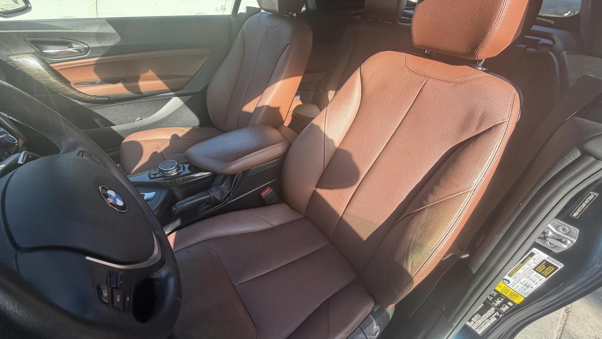 2015 Atlantis Metallic /Black BMW 2-Series 228xi Convertible (WBA1K7C54FV) with an 2.0L L4 DOHC 16V engine, 8A transmission, located at 30 S. Berkeley Avenue, Pasadena, CA, 91107, (626) 248-7567, 34.145447, -118.109398 - 2015 BMW 228i Convertible – Atlantis Metallic | Luxury, Style and Easy Financing in Pasadena Turn heads wherever you go in this stunning 2015 BMW 228i Convertible, finished in rare Atlantis Metallic, a gorgeous blue-green color that shifts beautifully in the sunlight. With its black leather i - Photo#13