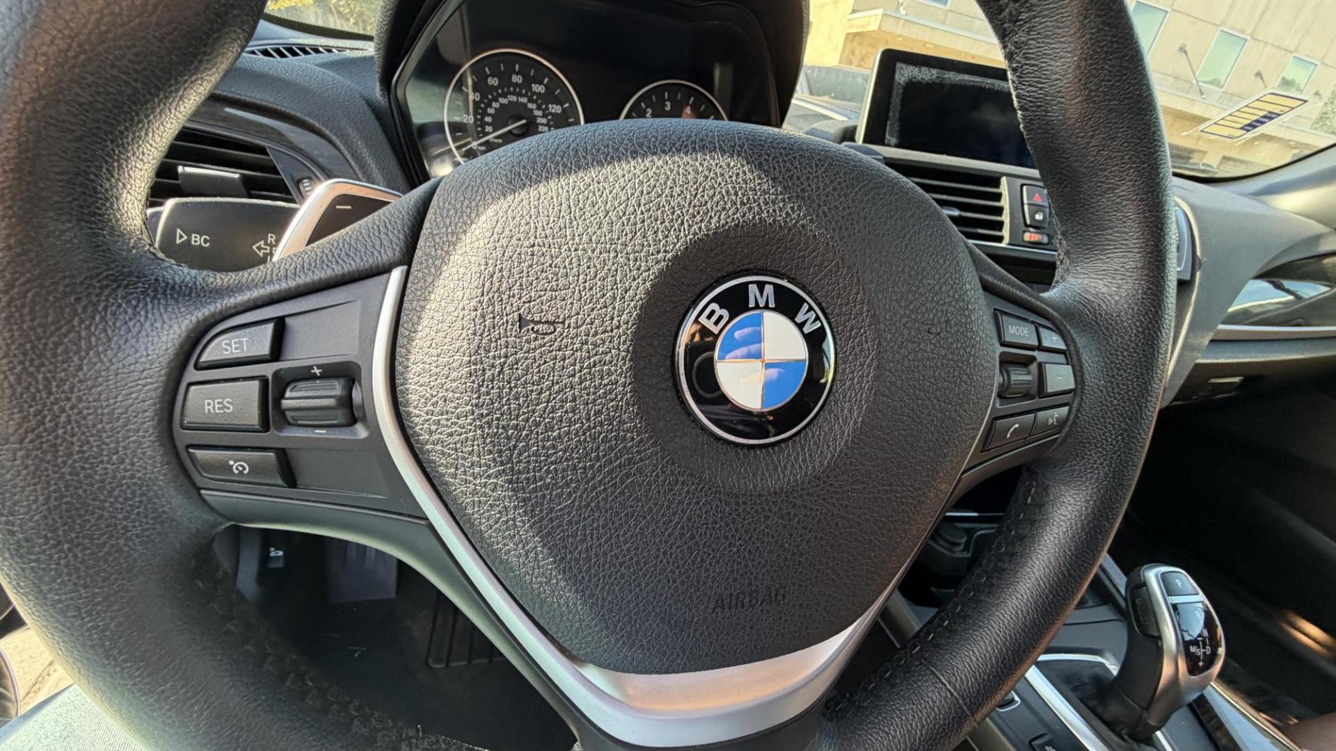 2015 Atlantis Metallic /Black BMW 2-Series 228xi Convertible (WBA1K7C54FV) with an 2.0L L4 DOHC 16V engine, 8A transmission, located at 30 S. Berkeley Avenue, Pasadena, CA, 91107, (626) 248-7567, 34.145447, -118.109398 - 2015 BMW 228i Convertible – Atlantis Metallic | Luxury, Style and Easy Financing in Pasadena Turn heads wherever you go in this stunning 2015 BMW 228i Convertible, finished in rare Atlantis Metallic, a gorgeous blue-green color that shifts beautifully in the sunlight. With its black leather i - Photo#15