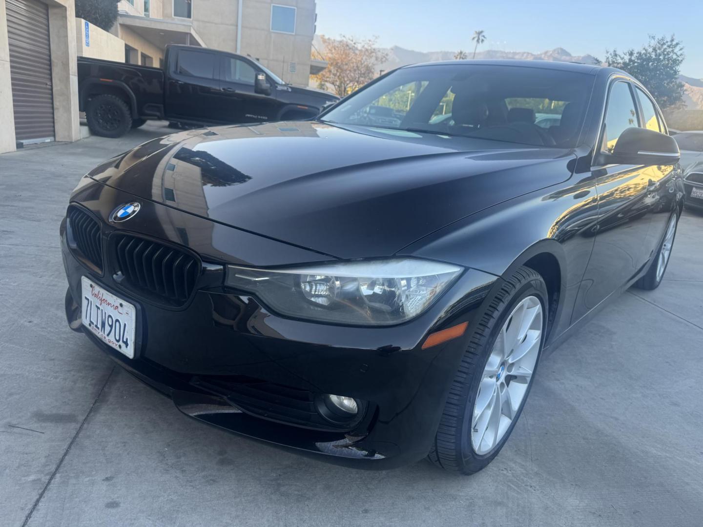 2015 BLACK /Black BMW 3-Series 320i Sedan (WBA3B1C56FK) with an 2.0L L4 DOHC 16V engine, 8-Speed Automatic transmission, located at 30 S. Berkeley Avenue, Pasadena, CA, 91107, (626) 248-7567, 34.145447, -118.109398 - For sale at Crown City Motors, 30 S Berkeley Ave, Pasadena, CA 91107: a sleek and sophisticated 2015 BMW 320i, loaded with premium features for an exceptional driving experience. This compact luxury sedan is equipped with navigation, a moonroof, a backup camera, and the coveted Premium Package, maki - Photo#0