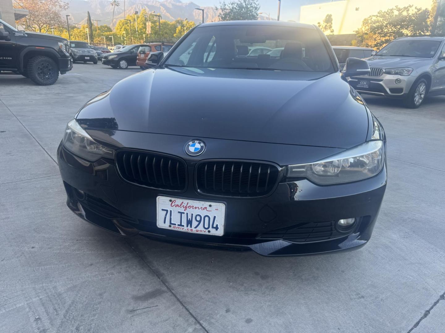 2015 BLACK /Black BMW 3-Series 320i Sedan (WBA3B1C56FK) with an 2.0L L4 DOHC 16V engine, 8-Speed Automatic transmission, located at 30 S. Berkeley Avenue, Pasadena, CA, 91107, (626) 248-7567, 34.145447, -118.109398 - For sale at Crown City Motors, 30 S Berkeley Ave, Pasadena, CA 91107: a sleek and sophisticated 2015 BMW 320i, loaded with premium features for an exceptional driving experience. This compact luxury sedan is equipped with navigation, a moonroof, a backup camera, and the coveted Premium Package, maki - Photo#1