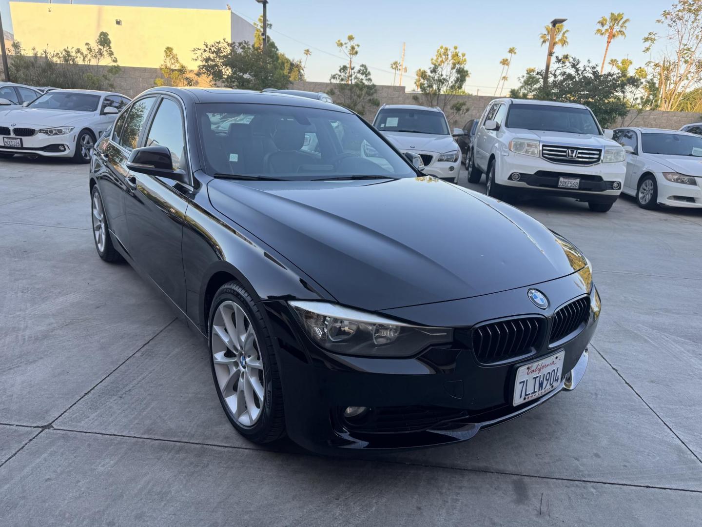 2015 BLACK /Black BMW 3-Series 320i Sedan (WBA3B1C56FK) with an 2.0L L4 DOHC 16V engine, 8-Speed Automatic transmission, located at 30 S. Berkeley Avenue, Pasadena, CA, 91107, (626) 248-7567, 34.145447, -118.109398 - For sale at Crown City Motors, 30 S Berkeley Ave, Pasadena, CA 91107: a sleek and sophisticated 2015 BMW 320i, loaded with premium features for an exceptional driving experience. This compact luxury sedan is equipped with navigation, a moonroof, a backup camera, and the coveted Premium Package, maki - Photo#2