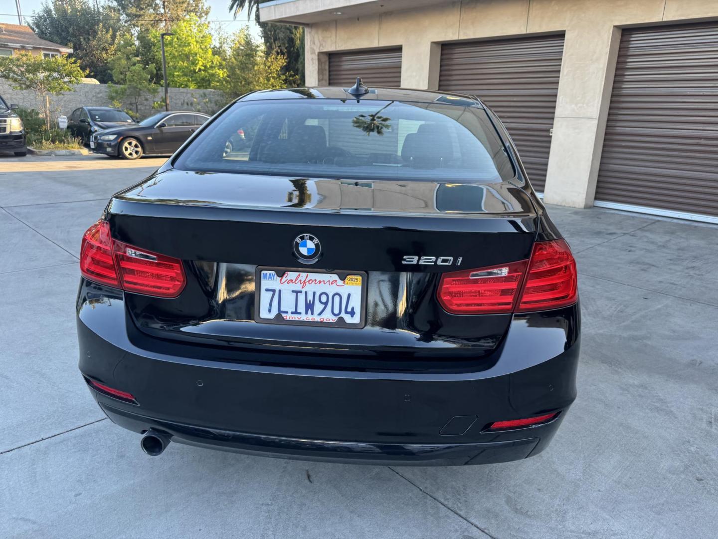 2015 BLACK /Black BMW 3-Series 320i Sedan (WBA3B1C56FK) with an 2.0L L4 DOHC 16V engine, 8-Speed Automatic transmission, located at 30 S. Berkeley Avenue, Pasadena, CA, 91107, (626) 248-7567, 34.145447, -118.109398 - For sale at Crown City Motors, 30 S Berkeley Ave, Pasadena, CA 91107: a sleek and sophisticated 2015 BMW 320i, loaded with premium features for an exceptional driving experience. This compact luxury sedan is equipped with navigation, a moonroof, a backup camera, and the coveted Premium Package, maki - Photo#5