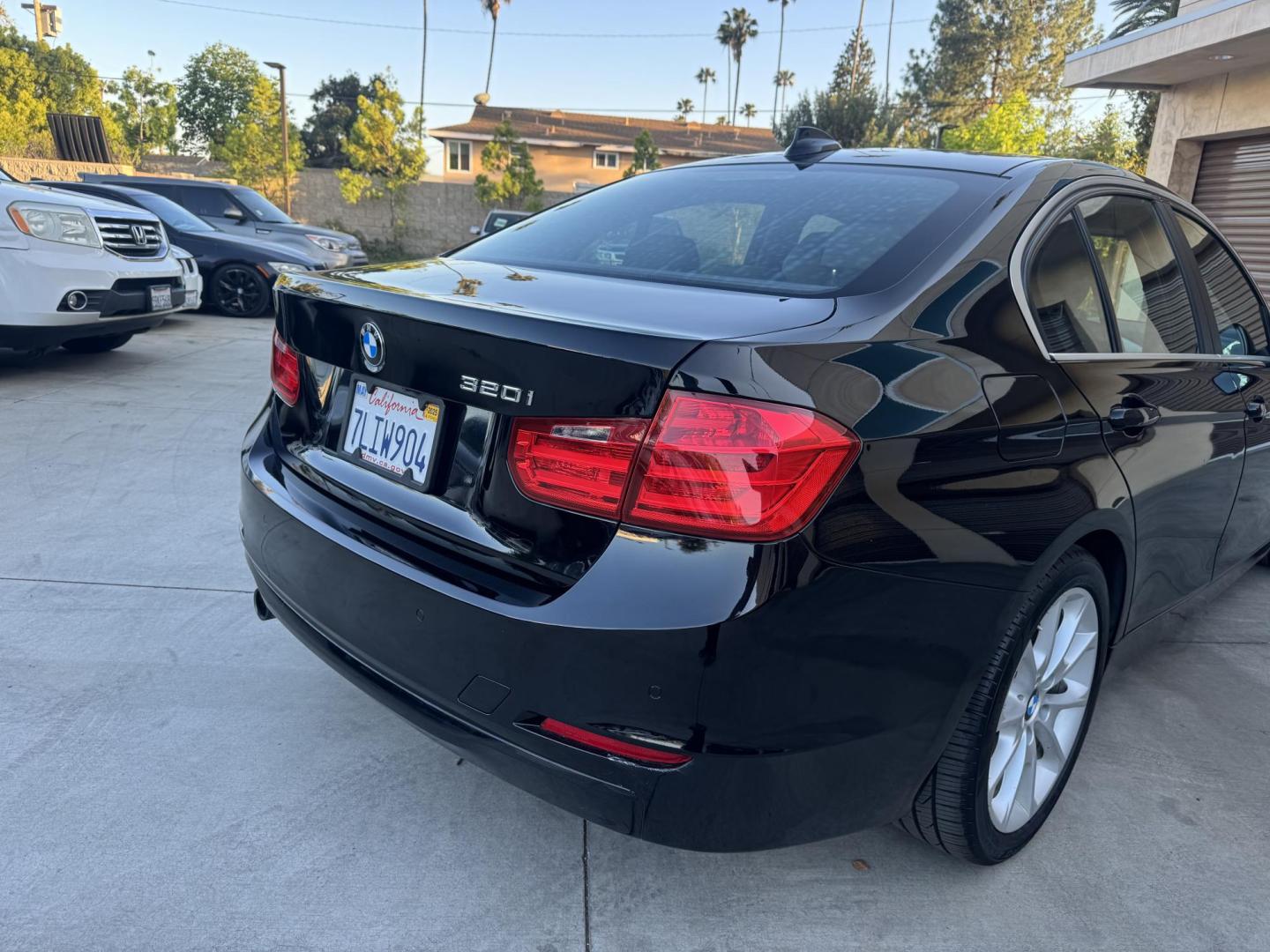 2015 BLACK /Black BMW 3-Series 320i Sedan (WBA3B1C56FK) with an 2.0L L4 DOHC 16V engine, 8-Speed Automatic transmission, located at 30 S. Berkeley Avenue, Pasadena, CA, 91107, (626) 248-7567, 34.145447, -118.109398 - For sale at Crown City Motors, 30 S Berkeley Ave, Pasadena, CA 91107: a sleek and sophisticated 2015 BMW 320i, loaded with premium features for an exceptional driving experience. This compact luxury sedan is equipped with navigation, a moonroof, a backup camera, and the coveted Premium Package, maki - Photo#4