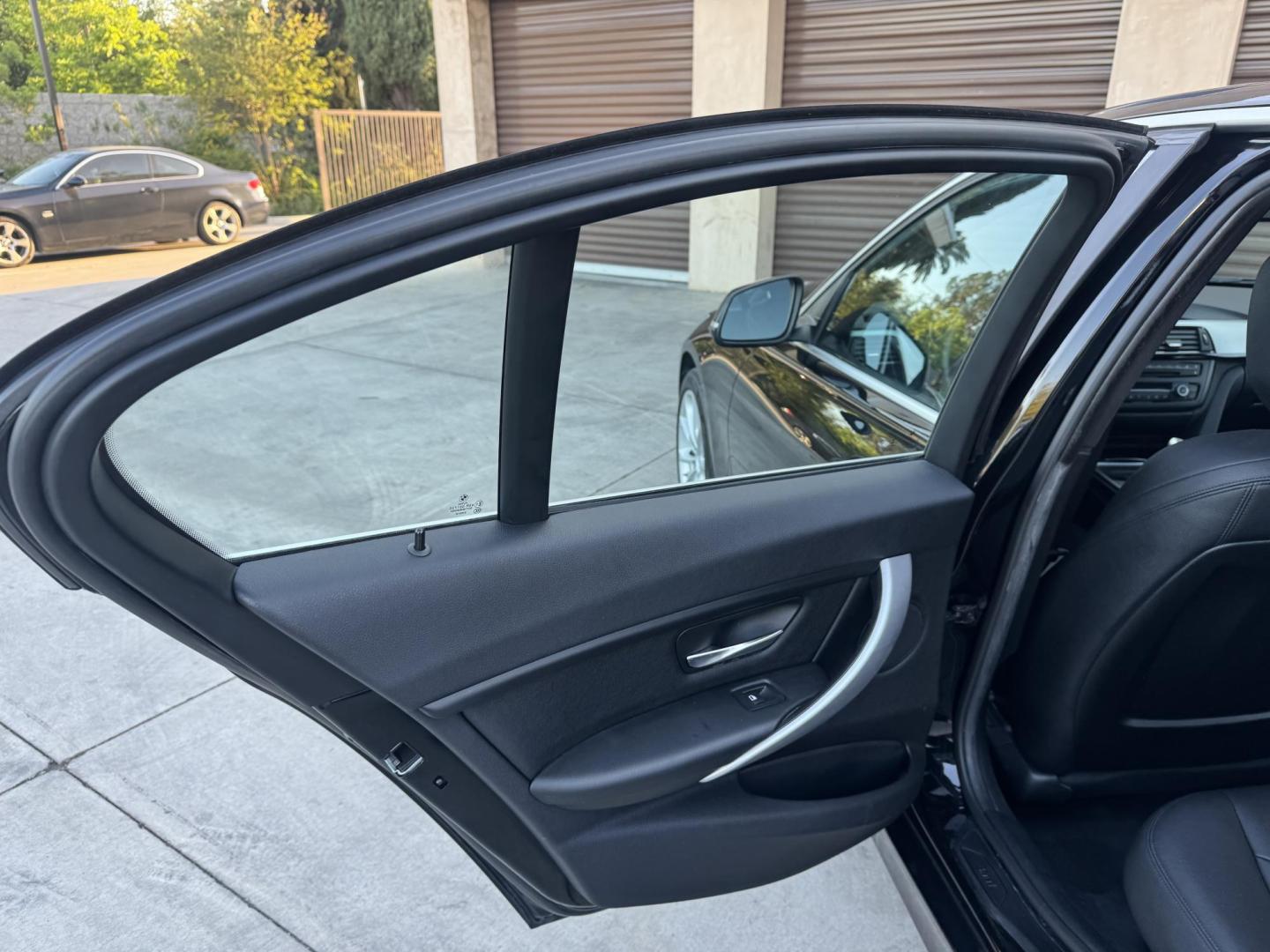2015 BLACK /Black BMW 3-Series 320i Sedan (WBA3B1C56FK) with an 2.0L L4 DOHC 16V engine, 8-Speed Automatic transmission, located at 30 S. Berkeley Avenue, Pasadena, CA, 91107, (626) 248-7567, 34.145447, -118.109398 - For sale at Crown City Motors, 30 S Berkeley Ave, Pasadena, CA 91107: a sleek and sophisticated 2015 BMW 320i, loaded with premium features for an exceptional driving experience. This compact luxury sedan is equipped with navigation, a moonroof, a backup camera, and the coveted Premium Package, maki - Photo#17