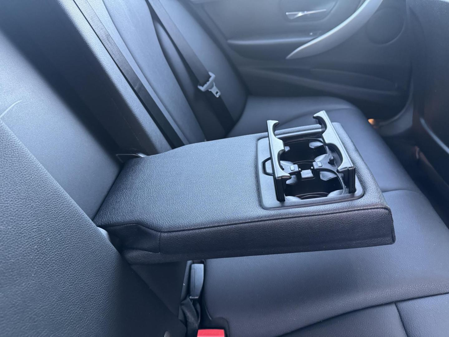 2015 BLACK /Black BMW 3-Series 320i Sedan (WBA3B1C56FK) with an 2.0L L4 DOHC 16V engine, 8-Speed Automatic transmission, located at 30 S. Berkeley Avenue, Pasadena, CA, 91107, (626) 248-7567, 34.145447, -118.109398 - For sale at Crown City Motors, 30 S Berkeley Ave, Pasadena, CA 91107: a sleek and sophisticated 2015 BMW 320i, loaded with premium features for an exceptional driving experience. This compact luxury sedan is equipped with navigation, a moonroof, a backup camera, and the coveted Premium Package, maki - Photo#20