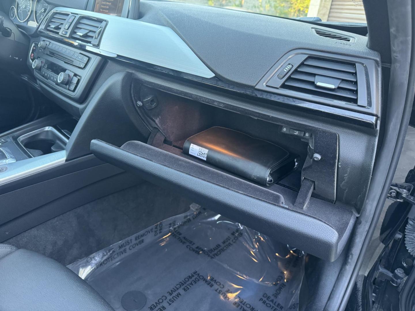 2015 BLACK /Black BMW 3-Series 320i Sedan (WBA3B1C56FK) with an 2.0L L4 DOHC 16V engine, 8-Speed Automatic transmission, located at 30 S. Berkeley Avenue, Pasadena, CA, 91107, (626) 248-7567, 34.145447, -118.109398 - For sale at Crown City Motors, 30 S Berkeley Ave, Pasadena, CA 91107: a sleek and sophisticated 2015 BMW 320i, loaded with premium features for an exceptional driving experience. This compact luxury sedan is equipped with navigation, a moonroof, a backup camera, and the coveted Premium Package, maki - Photo#26