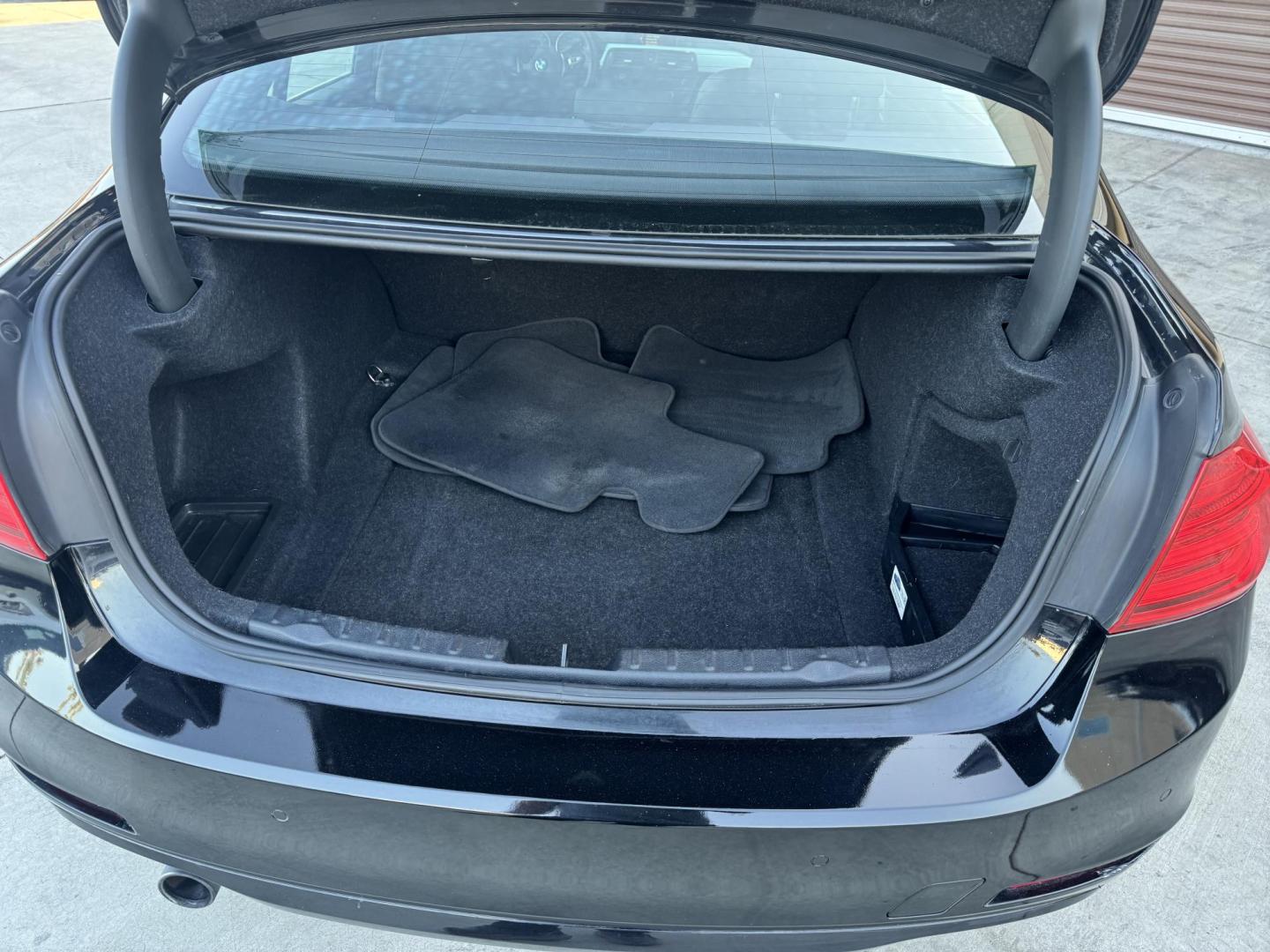 2015 BLACK /Black BMW 3-Series 320i Sedan (WBA3B1C56FK) with an 2.0L L4 DOHC 16V engine, 8-Speed Automatic transmission, located at 30 S. Berkeley Avenue, Pasadena, CA, 91107, (626) 248-7567, 34.145447, -118.109398 - For sale at Crown City Motors, 30 S Berkeley Ave, Pasadena, CA 91107: a sleek and sophisticated 2015 BMW 320i, loaded with premium features for an exceptional driving experience. This compact luxury sedan is equipped with navigation, a moonroof, a backup camera, and the coveted Premium Package, maki - Photo#32
