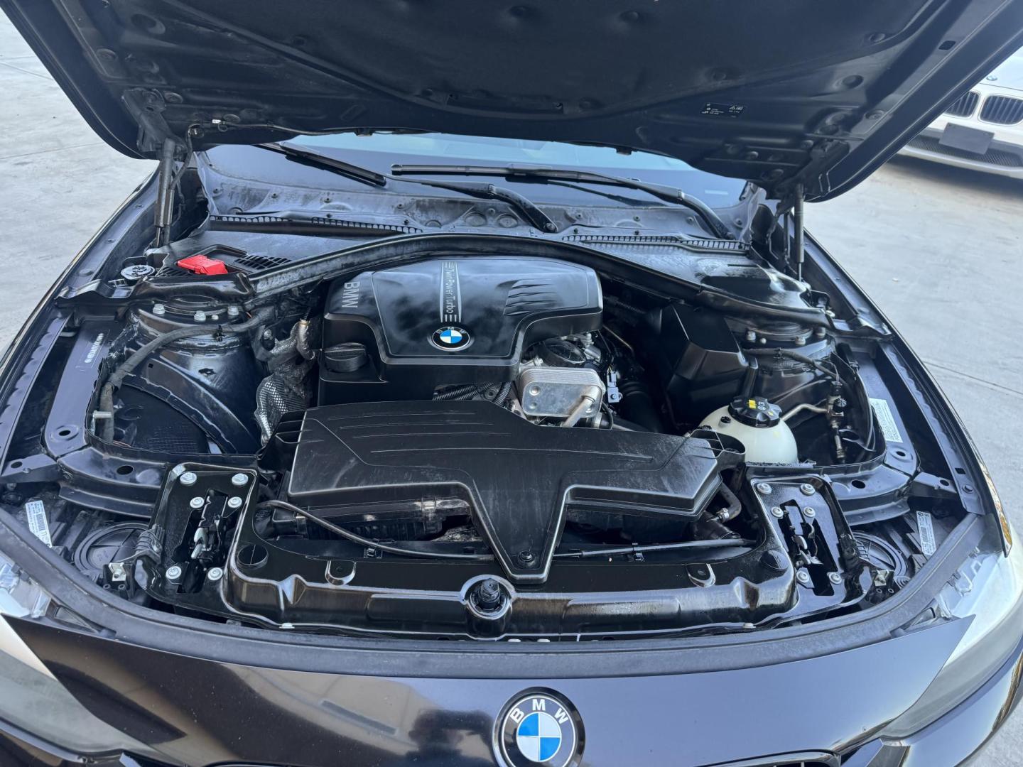2015 BLACK /Black BMW 3-Series 320i Sedan (WBA3B1C56FK) with an 2.0L L4 DOHC 16V engine, 8-Speed Automatic transmission, located at 30 S. Berkeley Avenue, Pasadena, CA, 91107, (626) 248-7567, 34.145447, -118.109398 - For sale at Crown City Motors, 30 S Berkeley Ave, Pasadena, CA 91107: a sleek and sophisticated 2015 BMW 320i, loaded with premium features for an exceptional driving experience. This compact luxury sedan is equipped with navigation, a moonroof, a backup camera, and the coveted Premium Package, maki - Photo#38