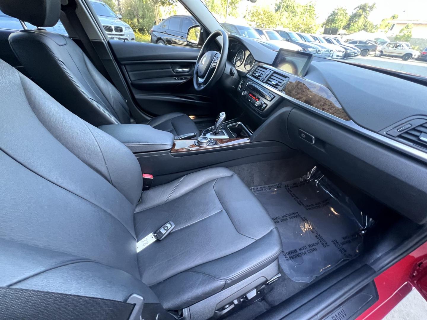 2015 Barcelona Red Metallic /black BMW 3-Series 328i xDrive Sedan (WBA3B3C52FJ) with an 2.0L L4 DOHC 16V engine, 8-Speed Automatic transmission, located at 30 S. Berkeley Avenue, Pasadena, CA, 91107, (626) 248-7567, 34.145447, -118.109398 - Crown City Motors is a used “Buy Here Pay Here” car dealer in Pasadena CA. “Buy Here Pay Here” financing, means that when you purchase your vehicle from our dealership, that you make the payments to the dealership as well. We do not need the banks approval to get you approved for a used auto - Photo#13