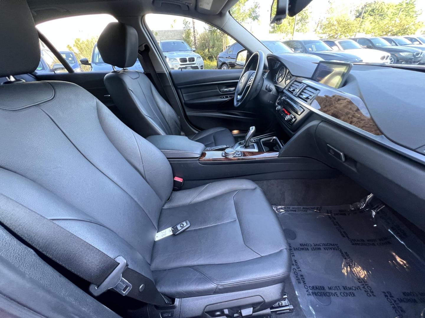 2015 Barcelona Red Metallic /black BMW 3-Series 328i xDrive Sedan (WBA3B3C52FJ) with an 2.0L L4 DOHC 16V engine, 8-Speed Automatic transmission, located at 30 S. Berkeley Avenue, Pasadena, CA, 91107, (626) 248-7567, 34.145447, -118.109398 - Crown City Motors is a used “Buy Here Pay Here” car dealer in Pasadena CA. “Buy Here Pay Here” financing, means that when you purchase your vehicle from our dealership, that you make the payments to the dealership as well. We do not need the banks approval to get you approved for a used auto - Photo#15