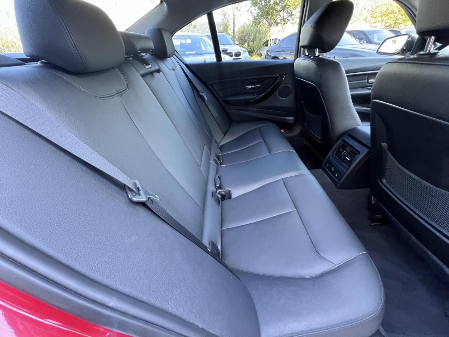 2015 Barcelona Red Metallic /black BMW 3-Series 328i xDrive Sedan (WBA3B3C52FJ) with an 2.0L L4 DOHC 16V engine, 8-Speed Automatic transmission, located at 30 S. Berkeley Avenue, Pasadena, CA, 91107, (626) 248-7567, 34.145447, -118.109398 - Crown City Motors is a used “Buy Here Pay Here” car dealer in Pasadena CA. “Buy Here Pay Here” financing, means that when you purchase your vehicle from our dealership, that you make the payments to the dealership as well. We do not need the banks approval to get you approved for a used auto - Photo#22