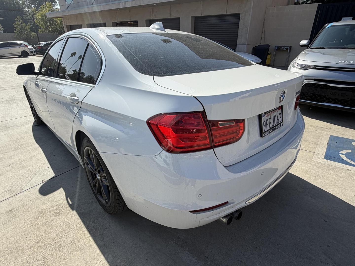 2015 White /Black BMW 3-Series 328i xDrive Sedan (WBA3B3G57FN) with an 2.0L L4 DOHC 16V engine, 8-Speed Automatic transmission, located at 30 S. Berkeley Avenue, Pasadena, CA, 91107, (626) 248-7567, 34.145447, -118.109398 - 2015 BMW 328i – Luxury, Performance, and Easy Financing in Pasadena Drive home today in this beautiful white BMW 328i with a sleek black interior—a luxury sport sedan that looks amazing, drives even better, and is available right now at Crown City Motors with Buy Here Pay Here financing. I - Photo#2