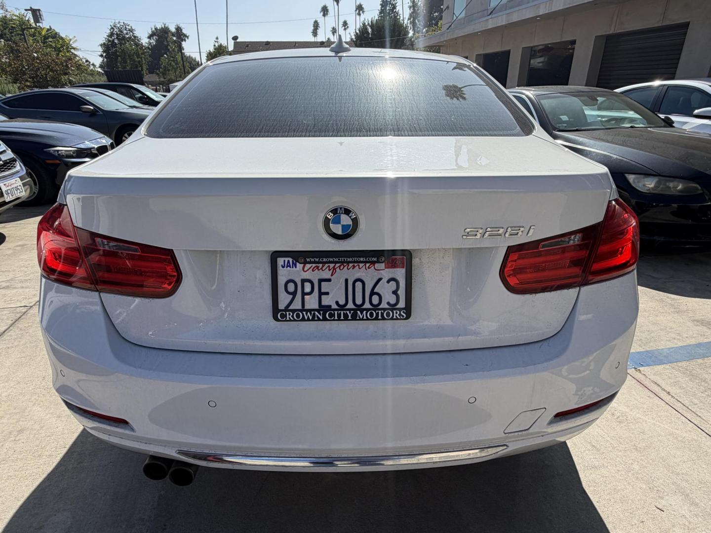 2015 White /Black BMW 3-Series 328i xDrive Sedan (WBA3B3G57FN) with an 2.0L L4 DOHC 16V engine, 8-Speed Automatic transmission, located at 30 S. Berkeley Avenue, Pasadena, CA, 91107, (626) 248-7567, 34.145447, -118.109398 - 2015 BMW 328i – Luxury, Performance, and Easy Financing in Pasadena Drive home today in this beautiful white BMW 328i with a sleek black interior—a luxury sport sedan that looks amazing, drives even better, and is available right now at Crown City Motors with Buy Here Pay Here financing. I - Photo#3