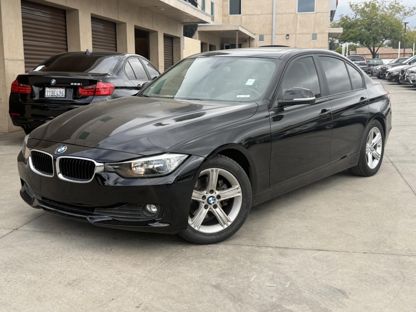 2015 Black /Black BMW 3-Series 320i Sedan (WBA3B1C52FK) with an 2.0L L4 DOHC 16V engine, 8-Speed Automatic transmission, located at 30 S. Berkeley Avenue, Pasadena, CA, 91107, (626) 248-7567, 34.145447, -118.109398 - Looking for a reliable, affordable luxury sedan with easy financing in Pasadena, CA? This 2015 BMW 3 Series (VIN: WBA3B1C52FK136158) is the perfect combination of performance, comfort, and efficiency—available now at Crown City Motors with Buy Here Pay Here financing designed for all credit situat - Photo#0