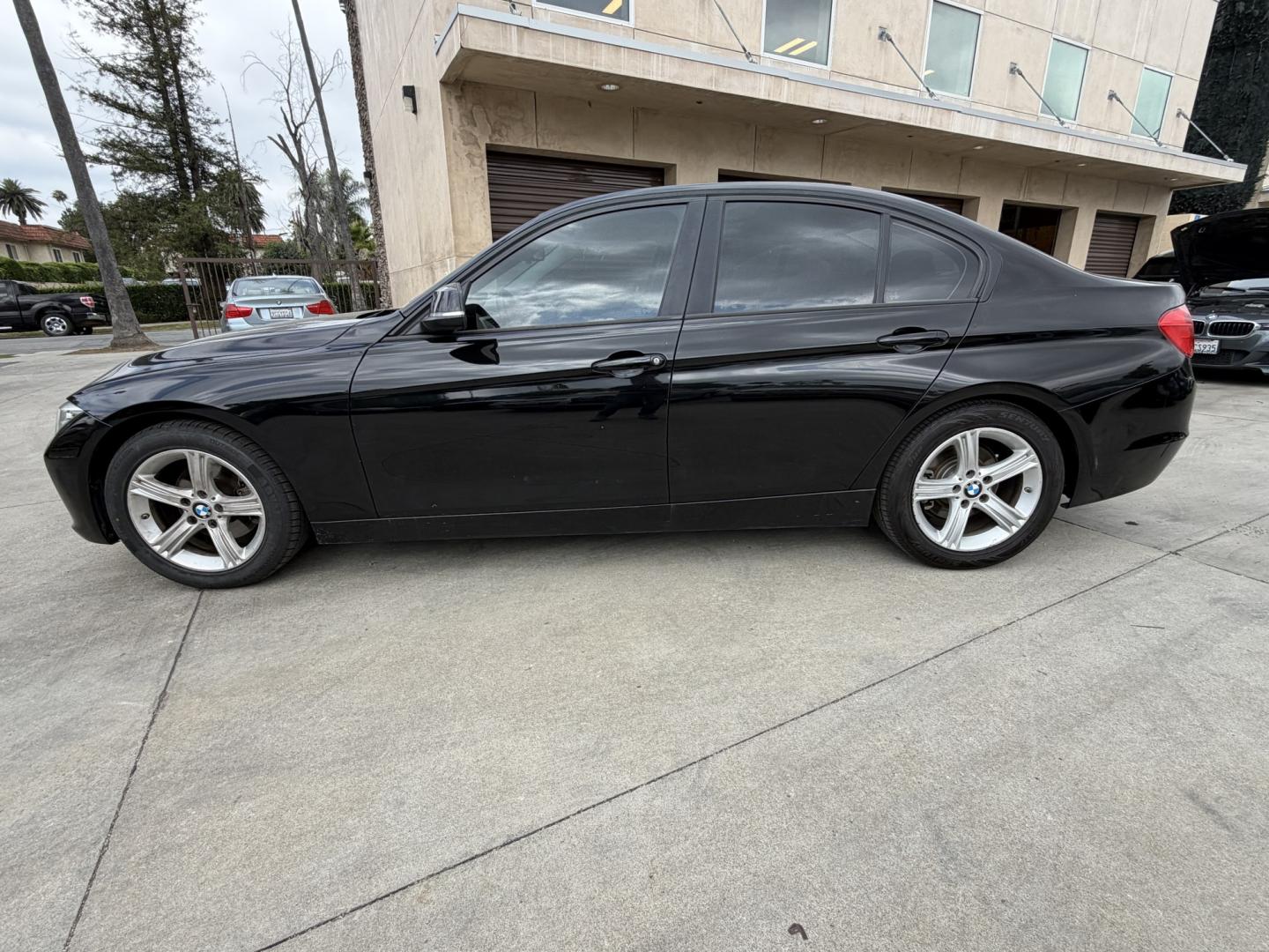 2015 Black /Black BMW 3-Series 320i Sedan (WBA3B1C52FK) with an 2.0L L4 DOHC 16V engine, 8-Speed Automatic transmission, located at 30 S. Berkeley Avenue, Pasadena, CA, 91107, (626) 248-7567, 34.145447, -118.109398 - Looking for a reliable, affordable luxury sedan with easy financing in Pasadena, CA? This 2015 BMW 3 Series (VIN: WBA3B1C52FK136158) is the perfect combination of performance, comfort, and efficiency—available now at Crown City Motors with Buy Here Pay Here financing designed for all credit situat - Photo#1