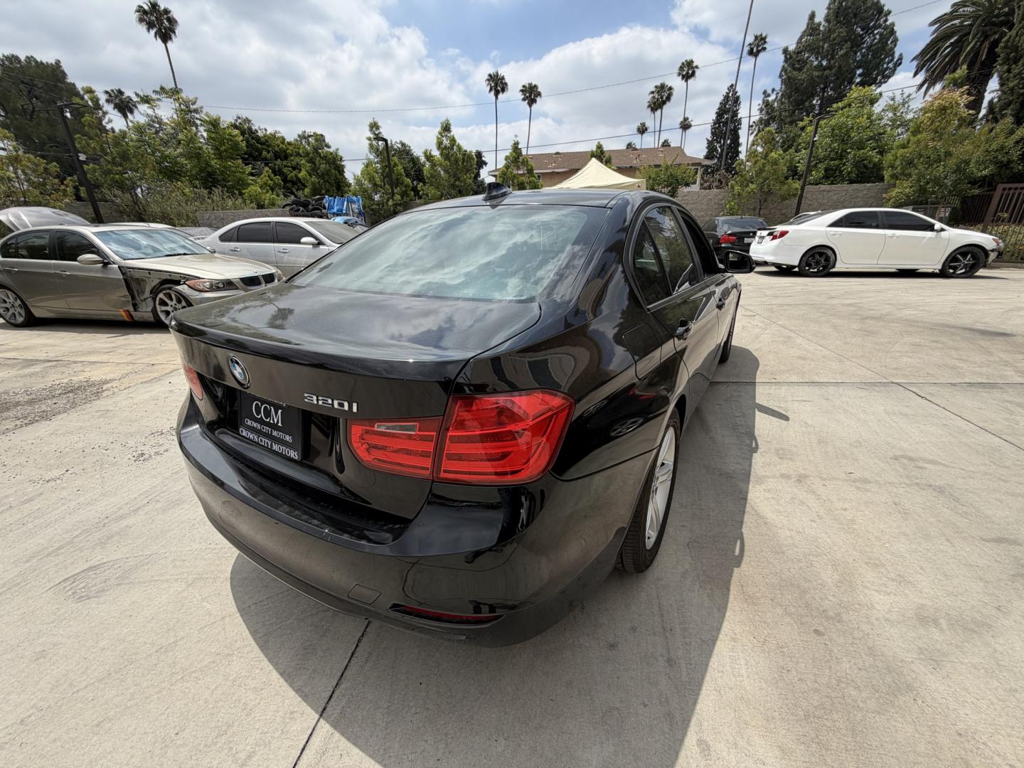 2015 Black /Black BMW 3-Series 320i Sedan (WBA3B1C52FK) with an 2.0L L4 DOHC 16V engine, 8-Speed Automatic transmission, located at 30 S. Berkeley Avenue, Pasadena, CA, 91107, (626) 248-7567, 34.145447, -118.109398 - Looking for a reliable, affordable luxury sedan with easy financing in Pasadena, CA? This 2015 BMW 3 Series (VIN: WBA3B1C52FK136158) is the perfect combination of performance, comfort, and efficiency—available now at Crown City Motors with Buy Here Pay Here financing designed for all credit situat - Photo#4