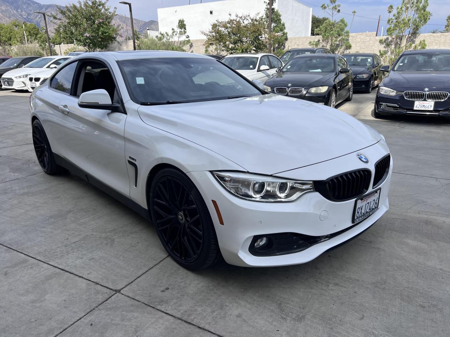 2015 White /black BMW 4-Series 428i SULEV Coupe (WBA3N7C58FK) with an 2.0L L4 DOHC 16V engine, 8-Speed Automatic transmission, located at 30 S. Berkeley Avenue, Pasadena, CA, 91107, (626) 248-7567, 34.145447, -118.109398 - Crown City Motors is a used “Buy Here Pay Here” car dealer in Pasadena CA. “Buy Here Pay Here” financing, means that when you purchase your vehicle from our dealership, that you make the payments to the dealership as well. We do not need the banks approval to get you approved for a used auto - Photo#2