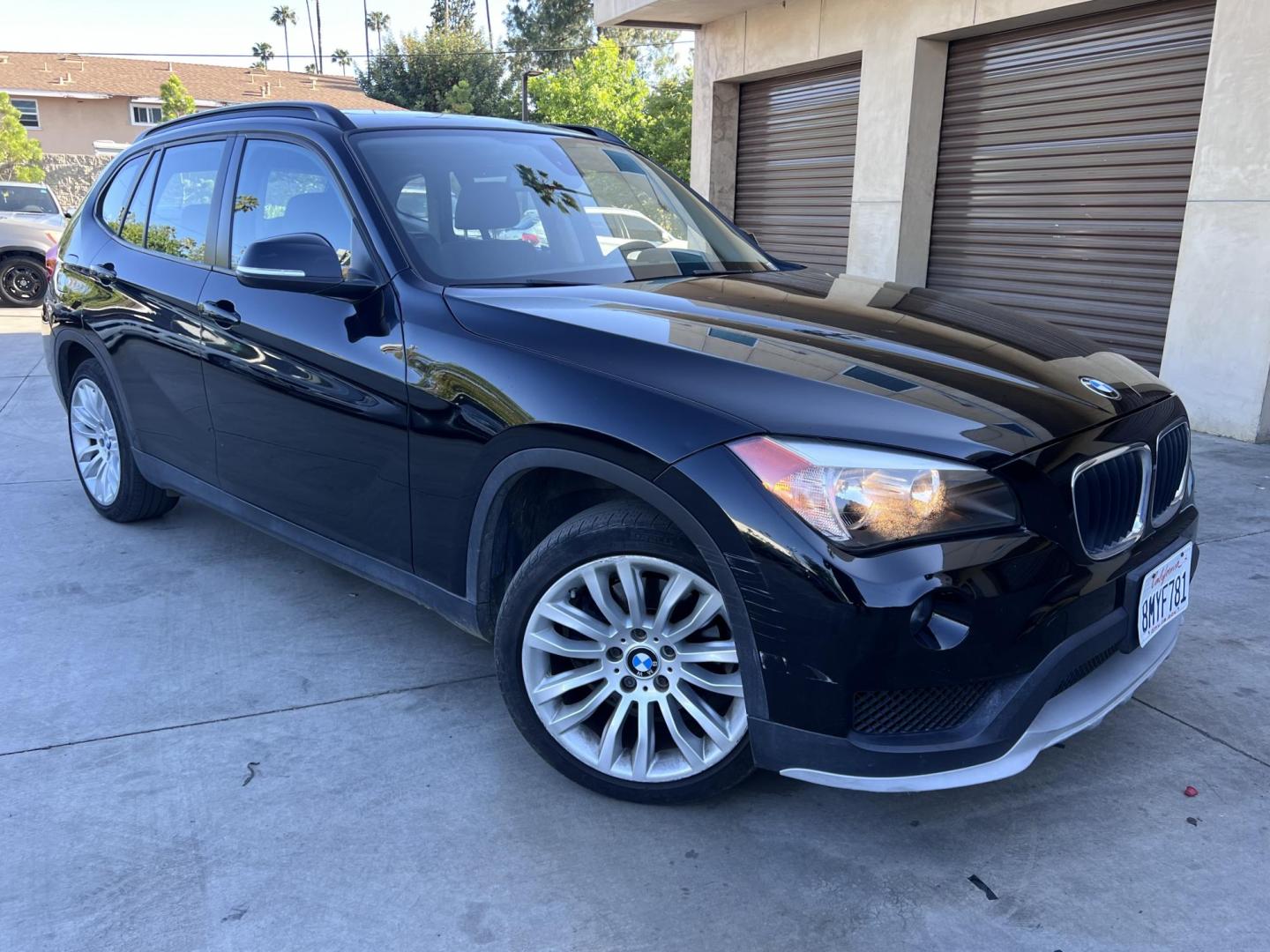 2015 BLACK /Black BMW X1 sDrive28i (WBAVM1C50FV) with an 2.0L L4 DOHC 16V engine, 8-Speed Automatic transmission, located at 30 S. Berkeley Avenue, Pasadena, CA, 91107, (626) 248-7567, 34.145447, -118.109398 - Low Mileage 2015 BMW X1 sDrive28i – Buy Here Pay Here – Bad Credit OK – Pasadena Dealer Looking for a sporty, luxury SUV with low miles and affordable financing? Check out this 2015 BMW X1 sDrive28i in excellent condition, now available at Crown City Motors in Pasadena, CA. With just 70,062 - Photo#0